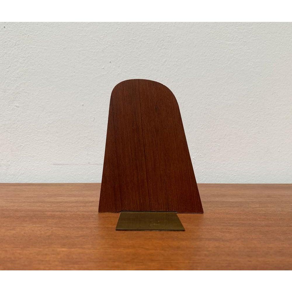 Fermalibri scandinavo di metà secolo in teak e ottone, in ottime condizioni. Progettato dal 1960 al 1969.

Informazioni aggiuntive:
Materiali: Ottone, Teak
Colore: marrone
Stili: Medioevo Moderno
Tipo di articolo: Vintage, Antico o