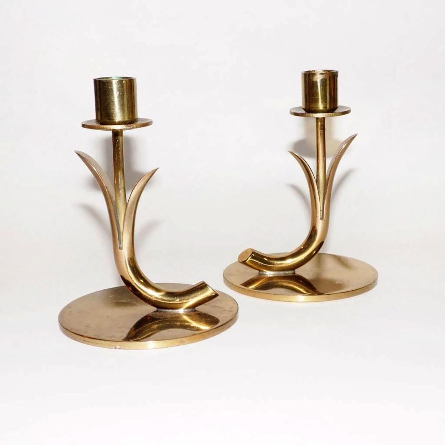 Scandinavian design pair of brass candleholders, designed by Gunnar Ander for Ystad Metall, Sweden, mid-1900s.
Very good used condition, with patina to the brass.
Dimensions: 8.5 cm height.
  