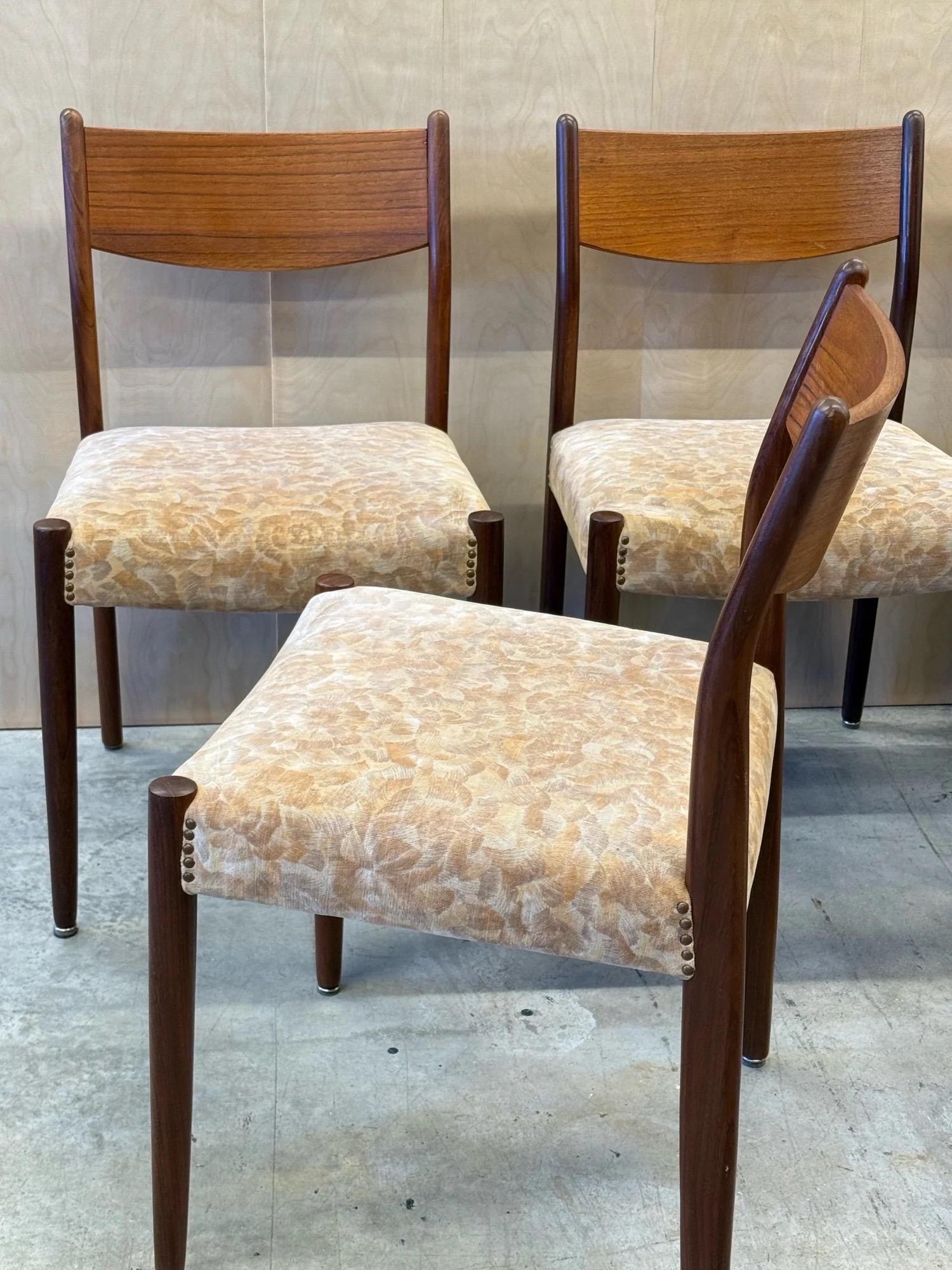 Mid-century Scandinavian dining chairs made from teak wood. This set of six features carved teak frames that accent the side profile of the chairs quite nicely. The frames slightly curve and connect to the backrest. The backrest has a mild concave
