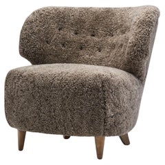 Skandinavischer Loungesessel aus Schafsleder, Skandinavien um 1950