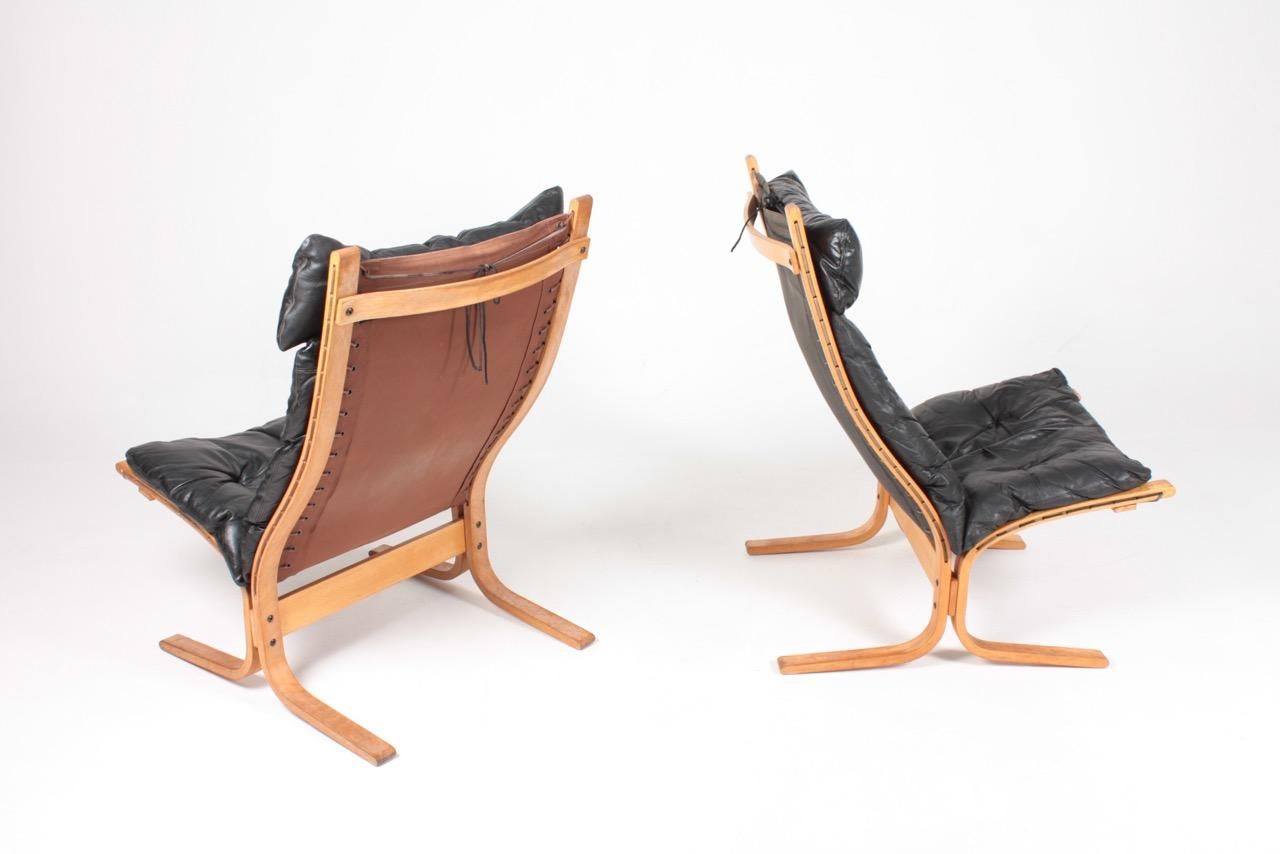 Mid-20th Century Midcentury Scandinavian Lounge Chairs in Patinated Leather by Ingmar Relling