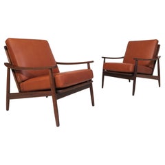 Mid-century Scandinavian Lounge Chairs in Saddle Leather