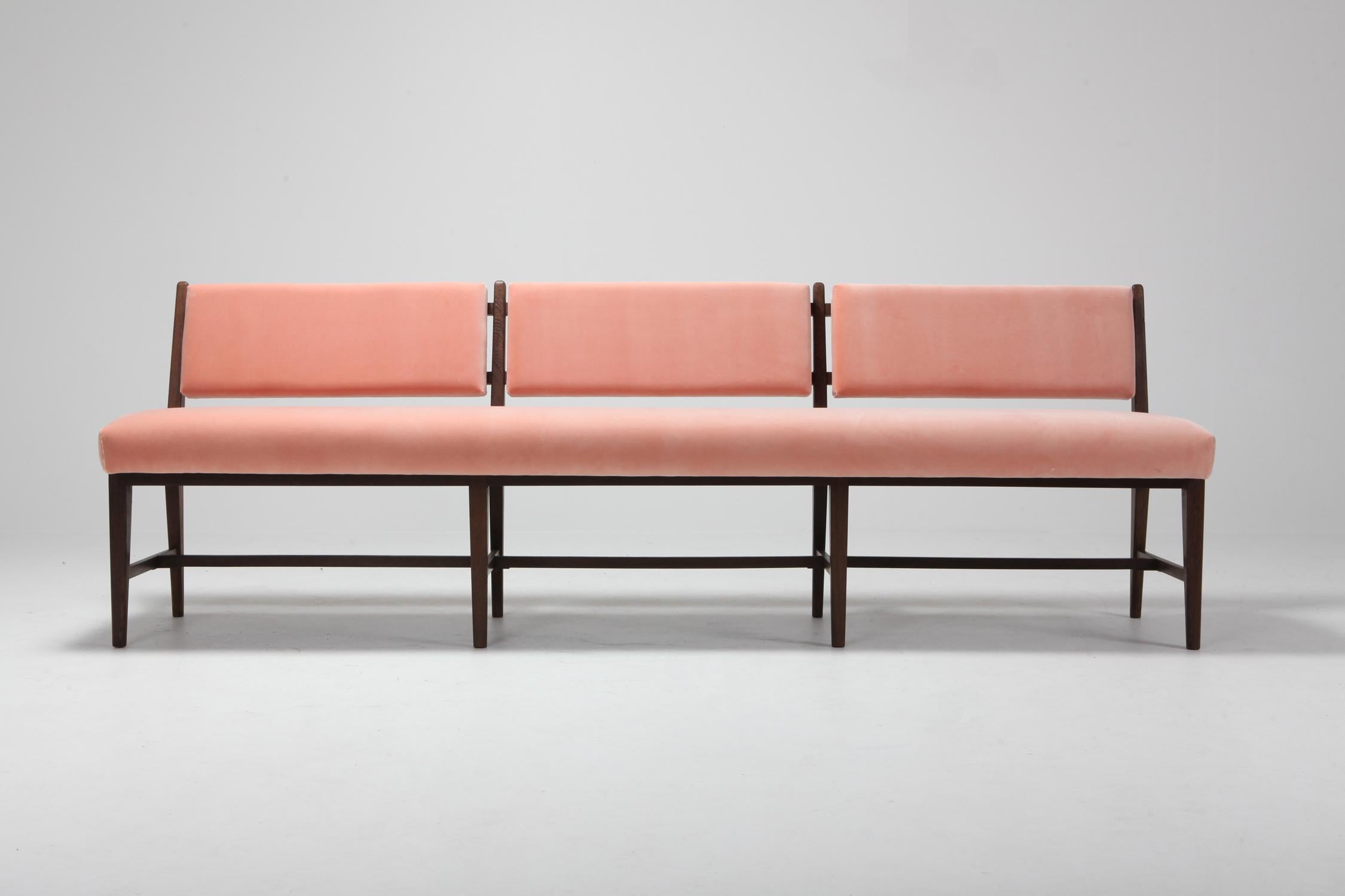 Minimalist extra large midcentury bench newly upholstered in pink velvet.
the Solid wengé frame brings nice contrast to the voluptuous upholstery.
Could fit well in a Minimlist Scandinavian Modern inspired interior as in a more eclectic Hollywood