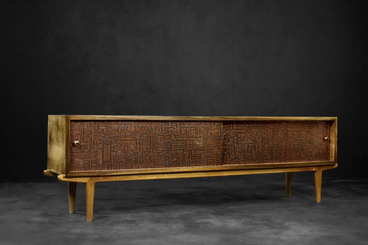 This modernist sideboard was produced in Scandinavia during the 1960s. It is made of birch wood, which has different grains depending on the region of its occurrence. It is very attractive, hard and at the same time elastic and resistant to