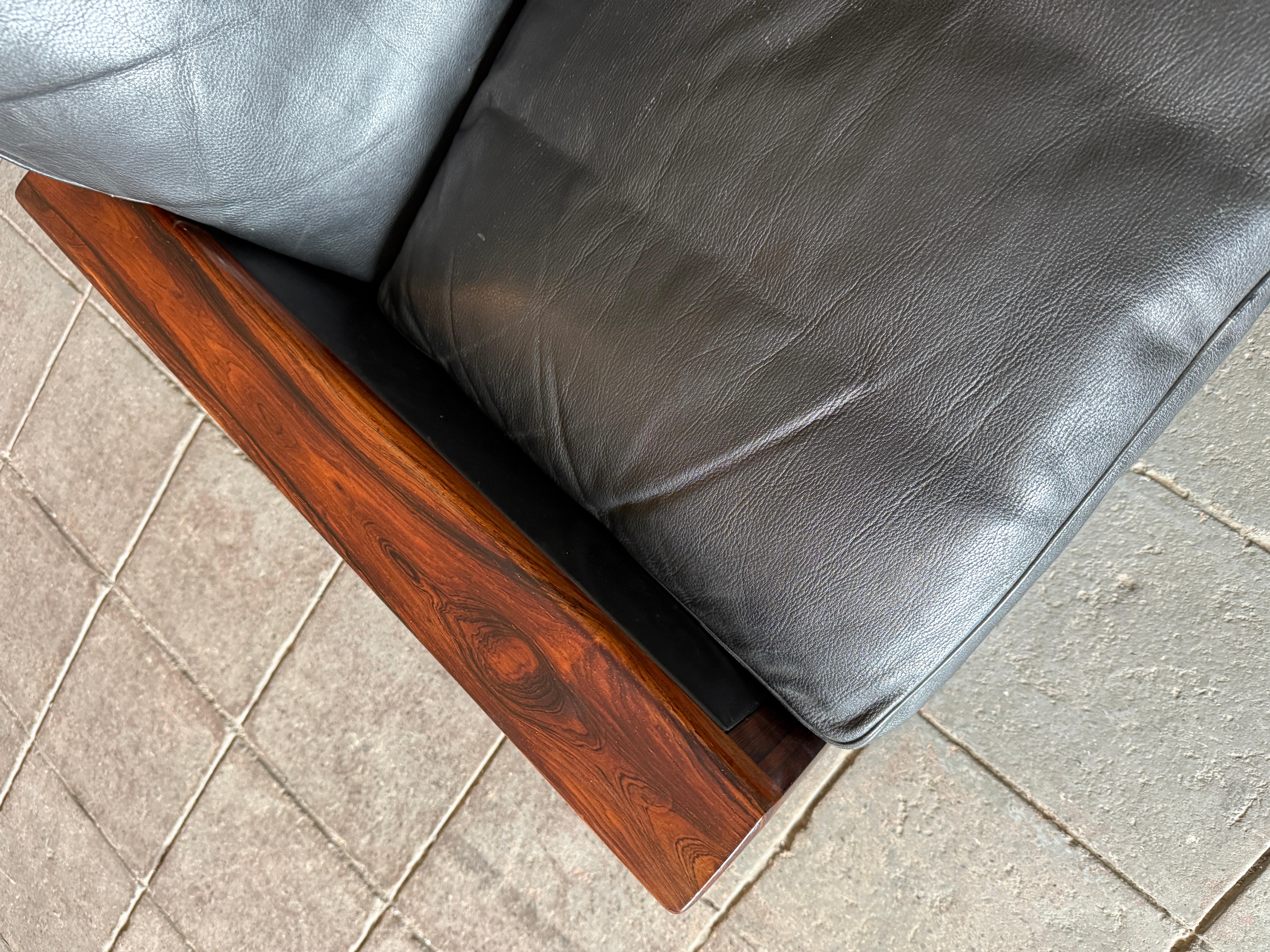 Leather Mid century Scandinavian modern black leather rosewood lounge chair Hans Olsen
