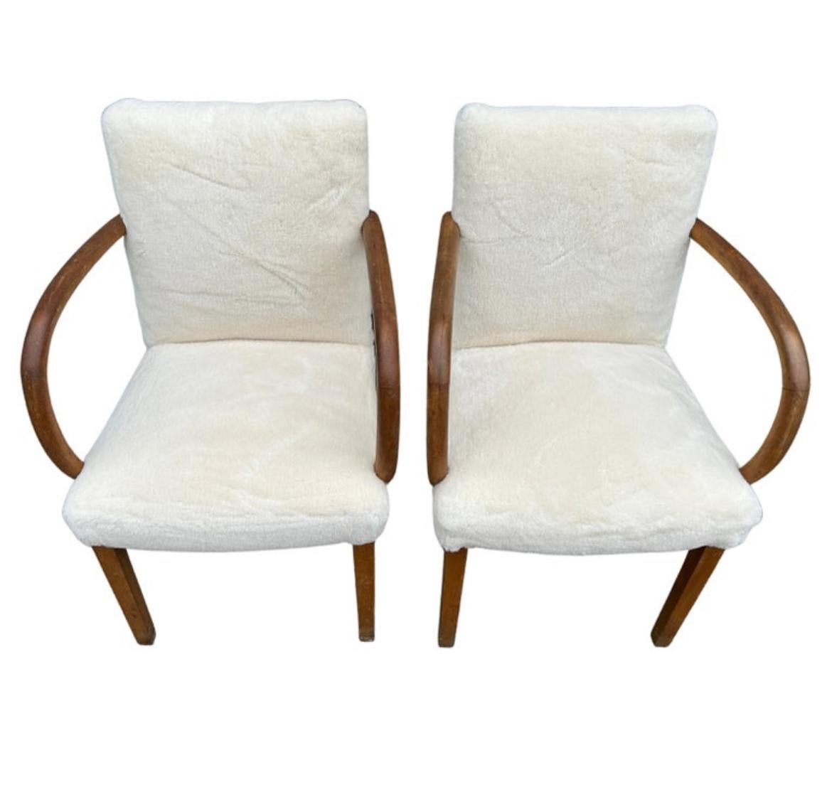 Scandinavian Modern curved armchair with white Sherpa wool upholstery. Beautiful design circa 1950. Made in Sweden. Located in Brooklyn NYC.

Chairs are being sold individually 

(2) available 

Dimensions 21” W x 28” D x 33.5” H
Seat Height 18”.
