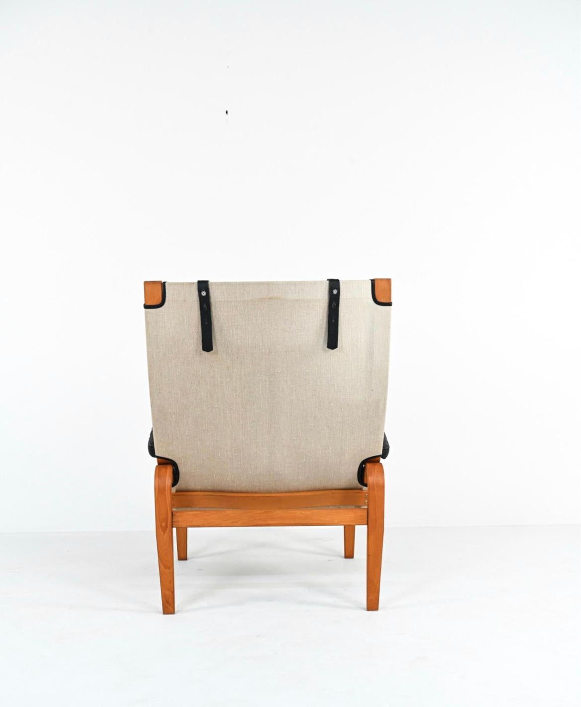 Mid-Century Modern Chaise longue en cuir et toile de style scandinave moderne du milieu du siècle dernier  en vente