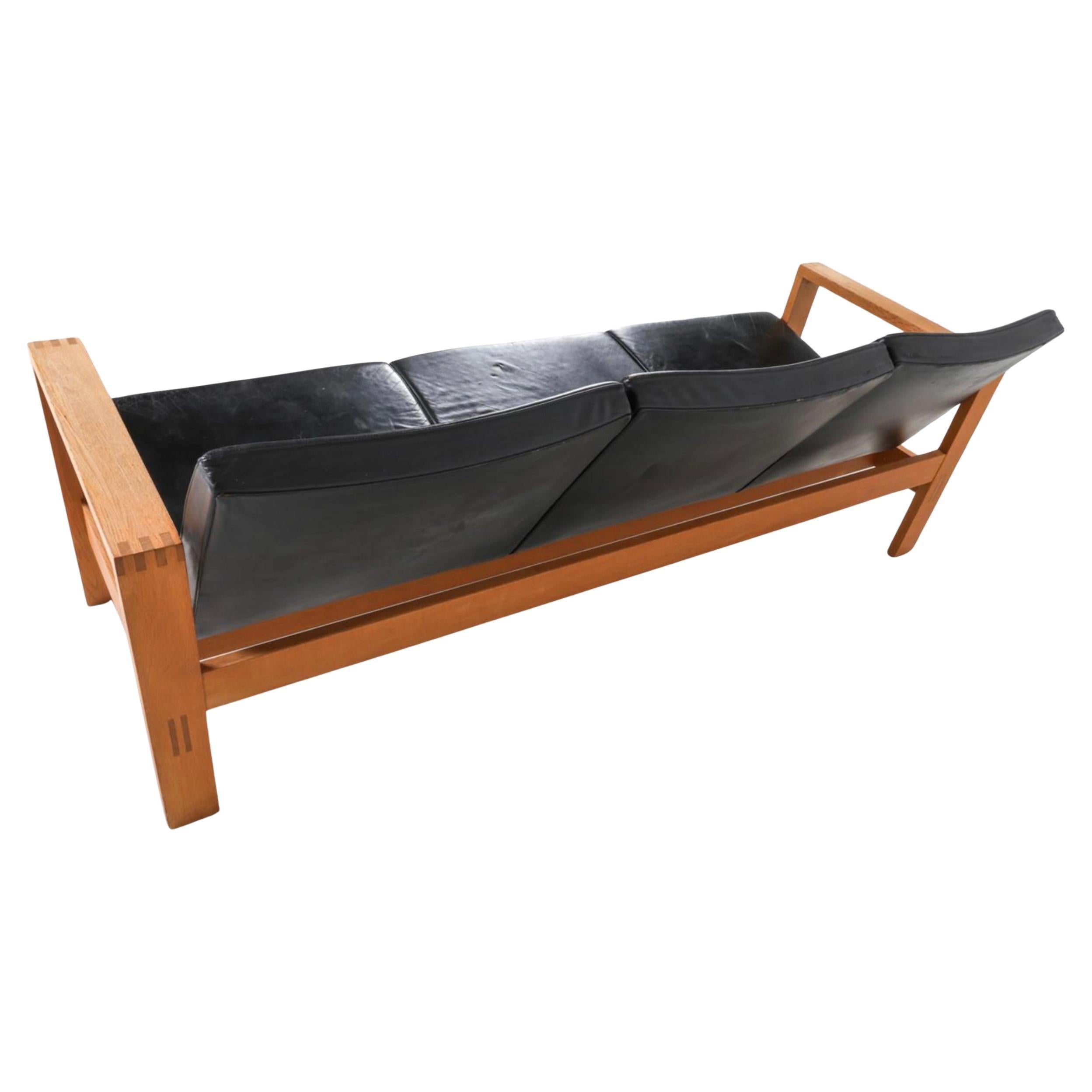 Late 20th Century Mid Century Scandinavian modern oak 3 seat black leather sofa made in Sweden For Sale