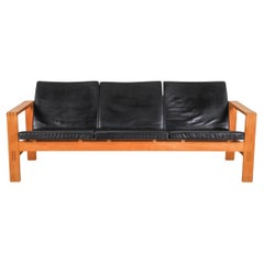 Mid Century Scandinavian modern oak 3 seat black leather sofa made in Sweden