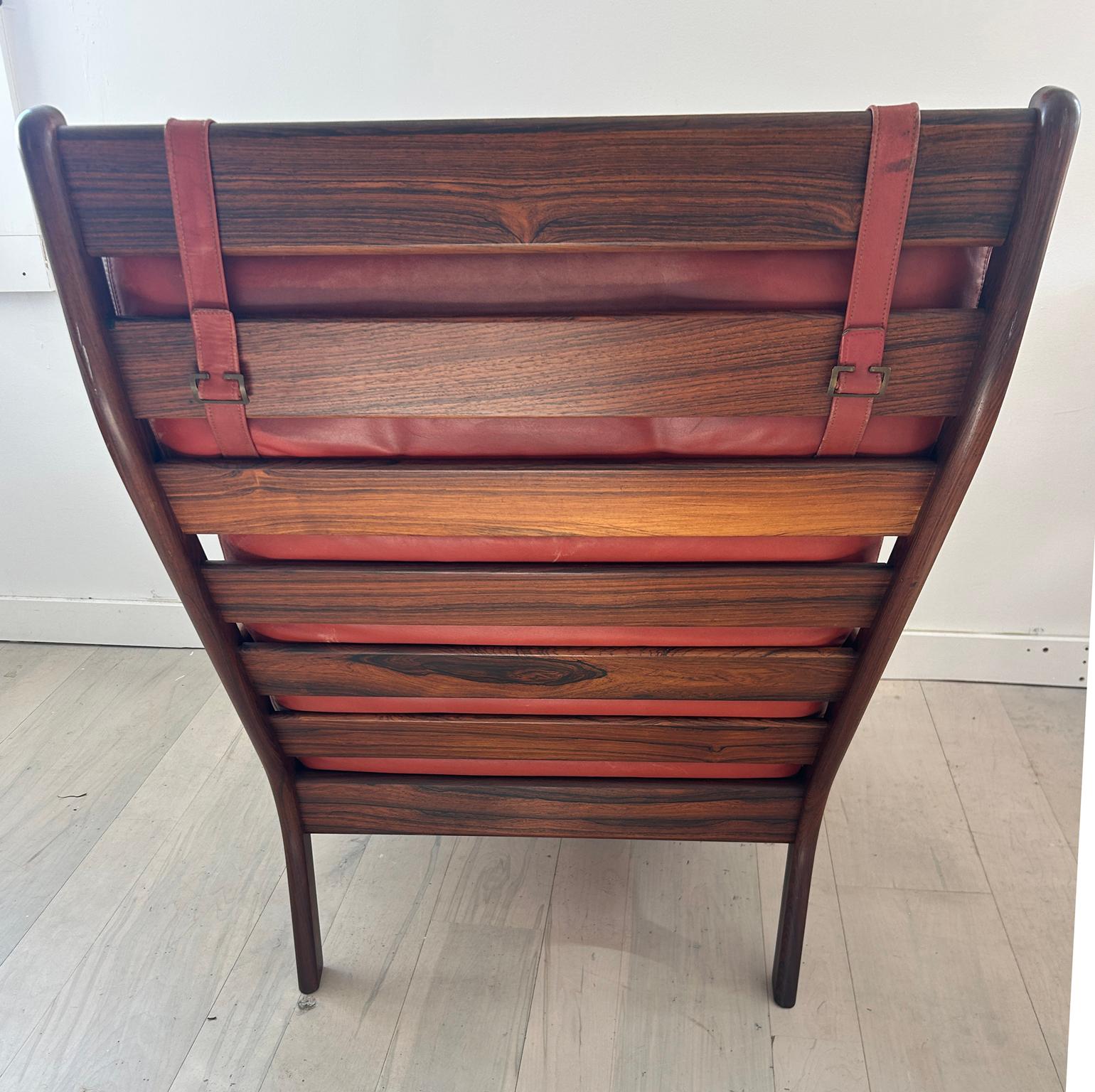 Midcentury Scandinavian Modern Solid Rosewood Red Leather Lounge Chair In Good Condition For Sale In BROOKLYN, NY