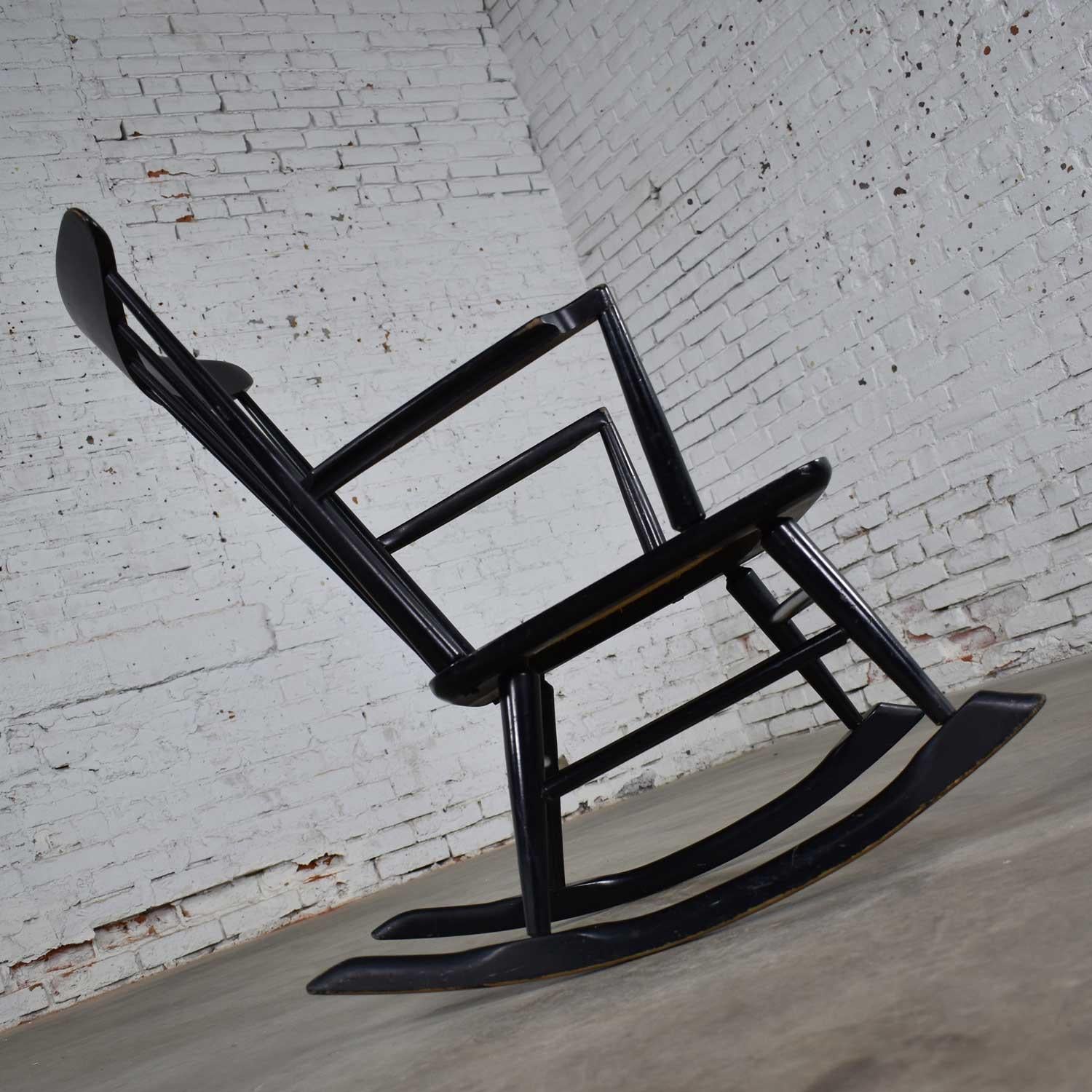 Midcentury Scandinavian Modern Style Spindle Back Rocking Chair Black with Cane In Good Condition In Topeka, KS