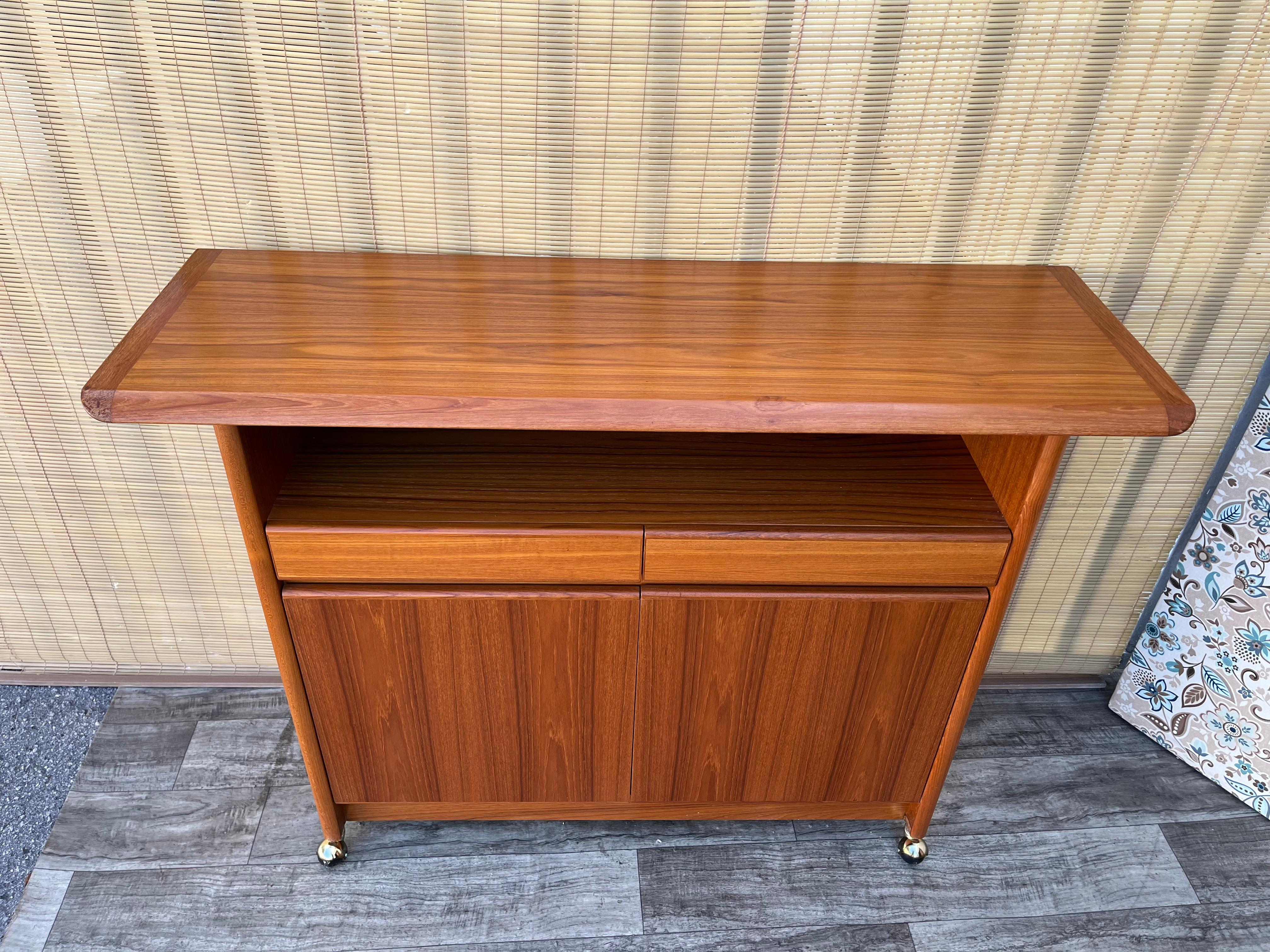 Canadian Mid Century Scandinavian Modern Style Teak Server With Casters. Circa 1980s For Sale