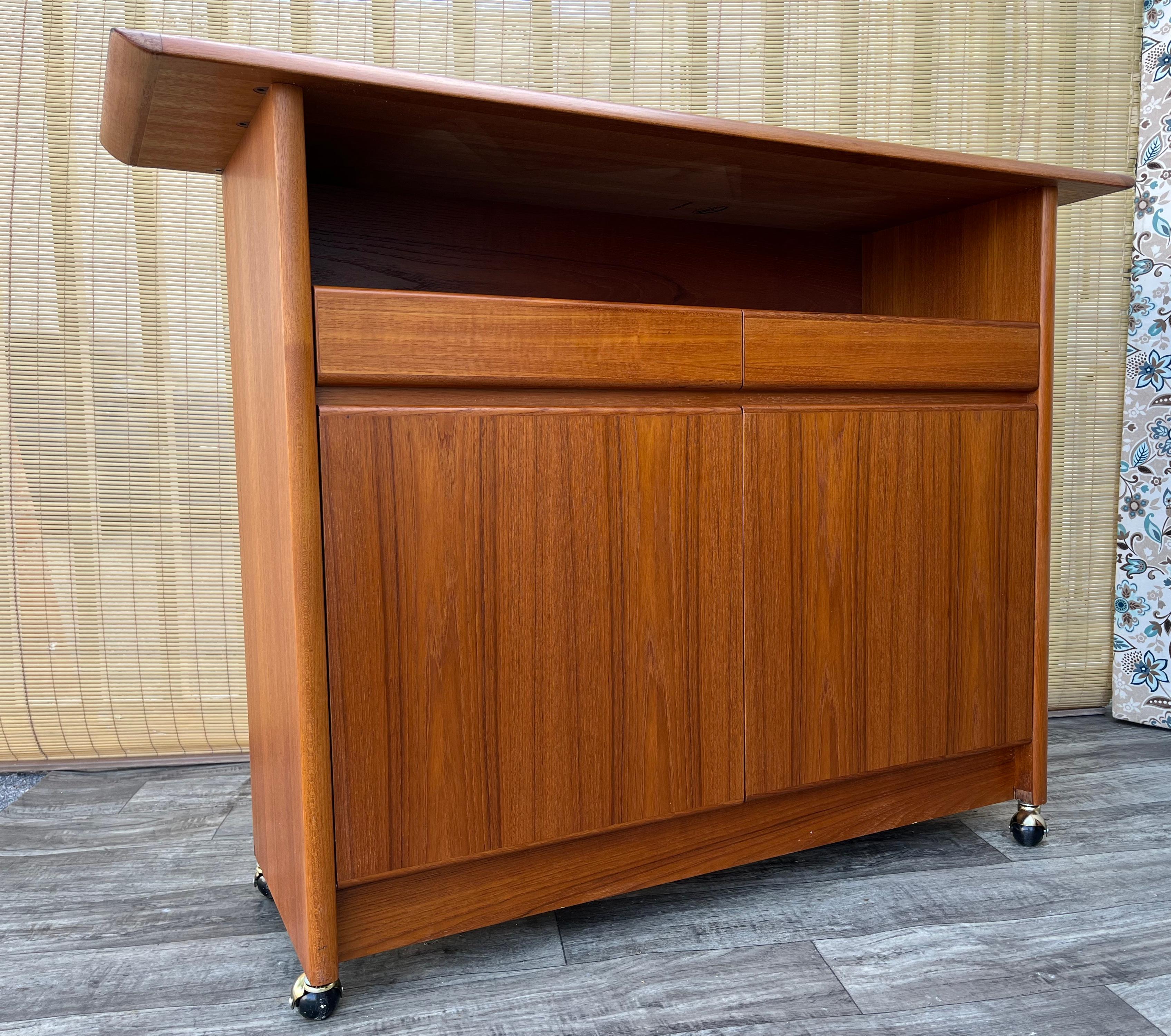 Late 20th Century Mid Century Scandinavian Modern Style Teak Server With Casters. Circa 1980s For Sale