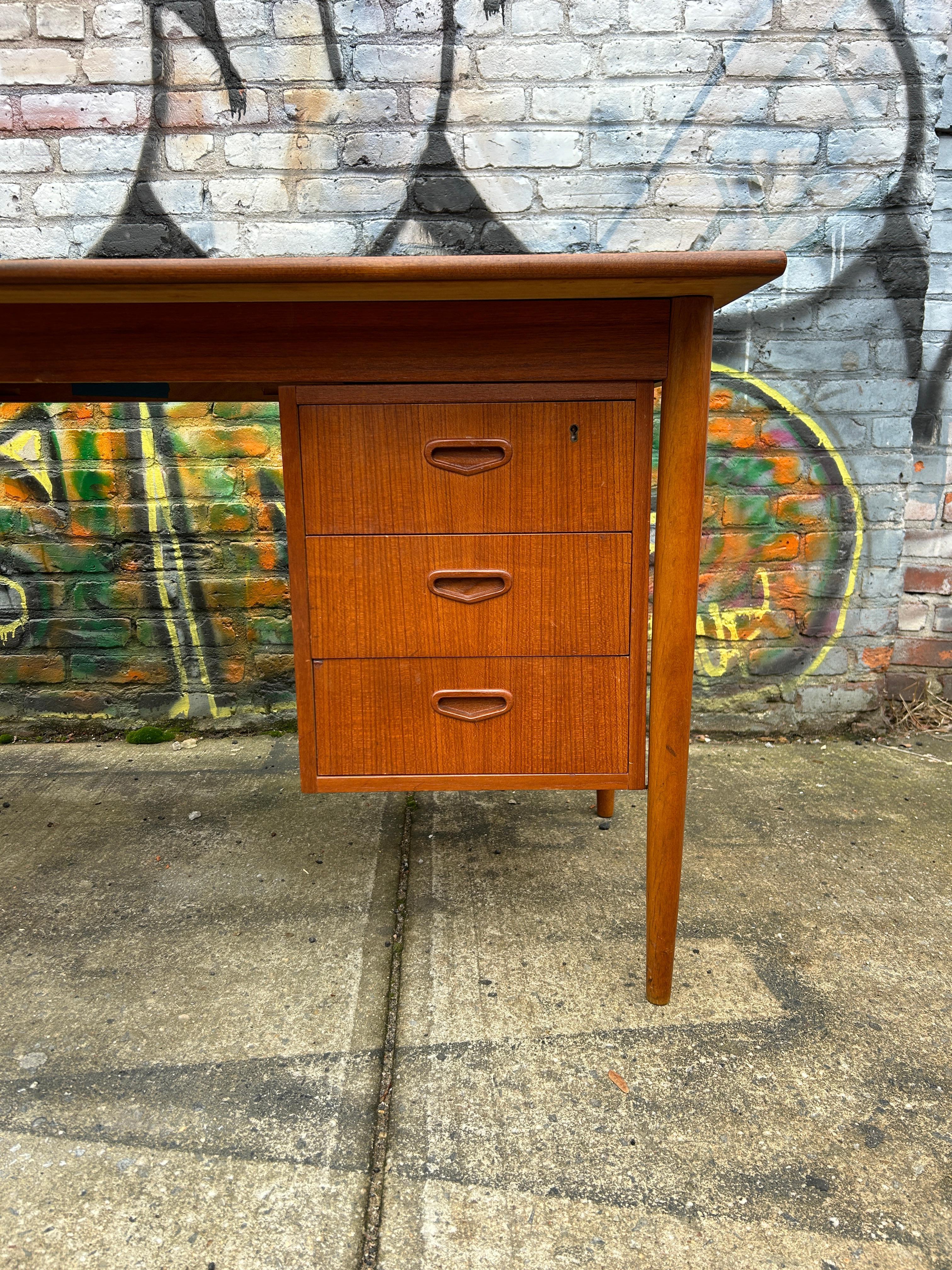 Mid-Century Modern Mid Century Scandinavian Modern teak 5 drawer desk with key Sweden For Sale