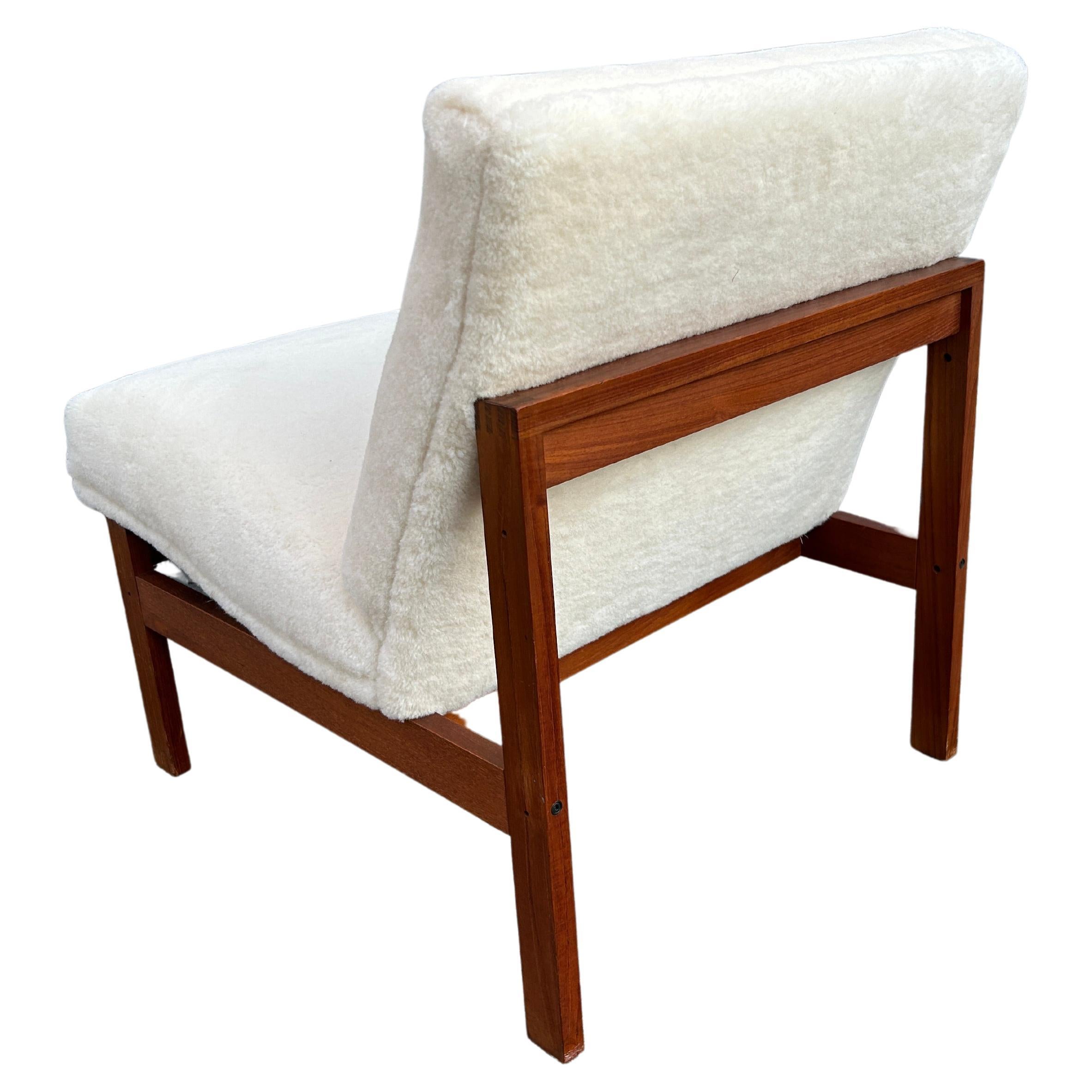 Mid century Scandinavian Modern teak frame slipper lounge chair shearling  In Good Condition In BROOKLYN, NY