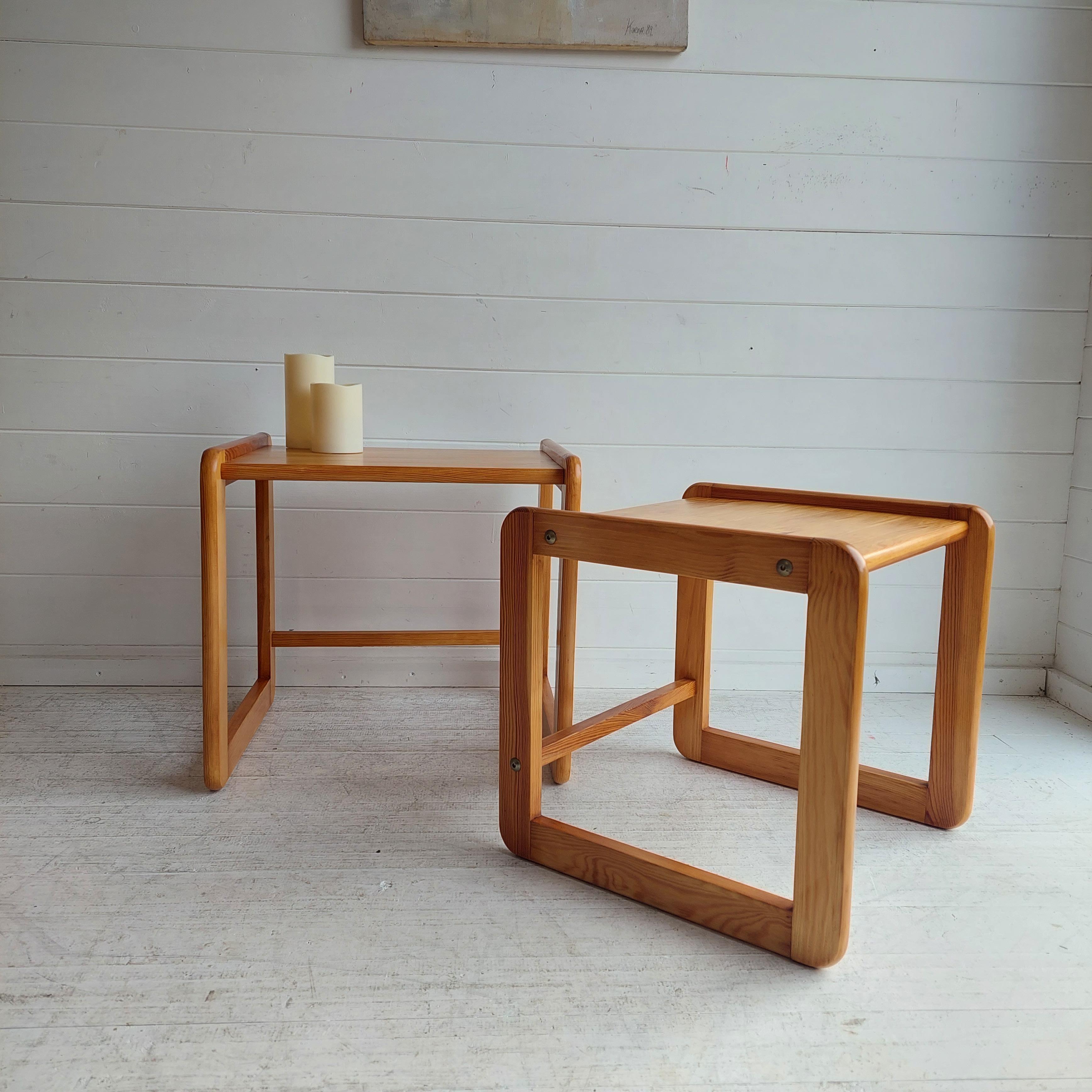 Scandinavian nesting tables in pine from the 70s

1970s, Danish design, minimalist, modernist, mid century modern design
Nesting tables, set of 2 side tables, coffee table
Solid pine
Nordic construction with the squared off frame with rounded