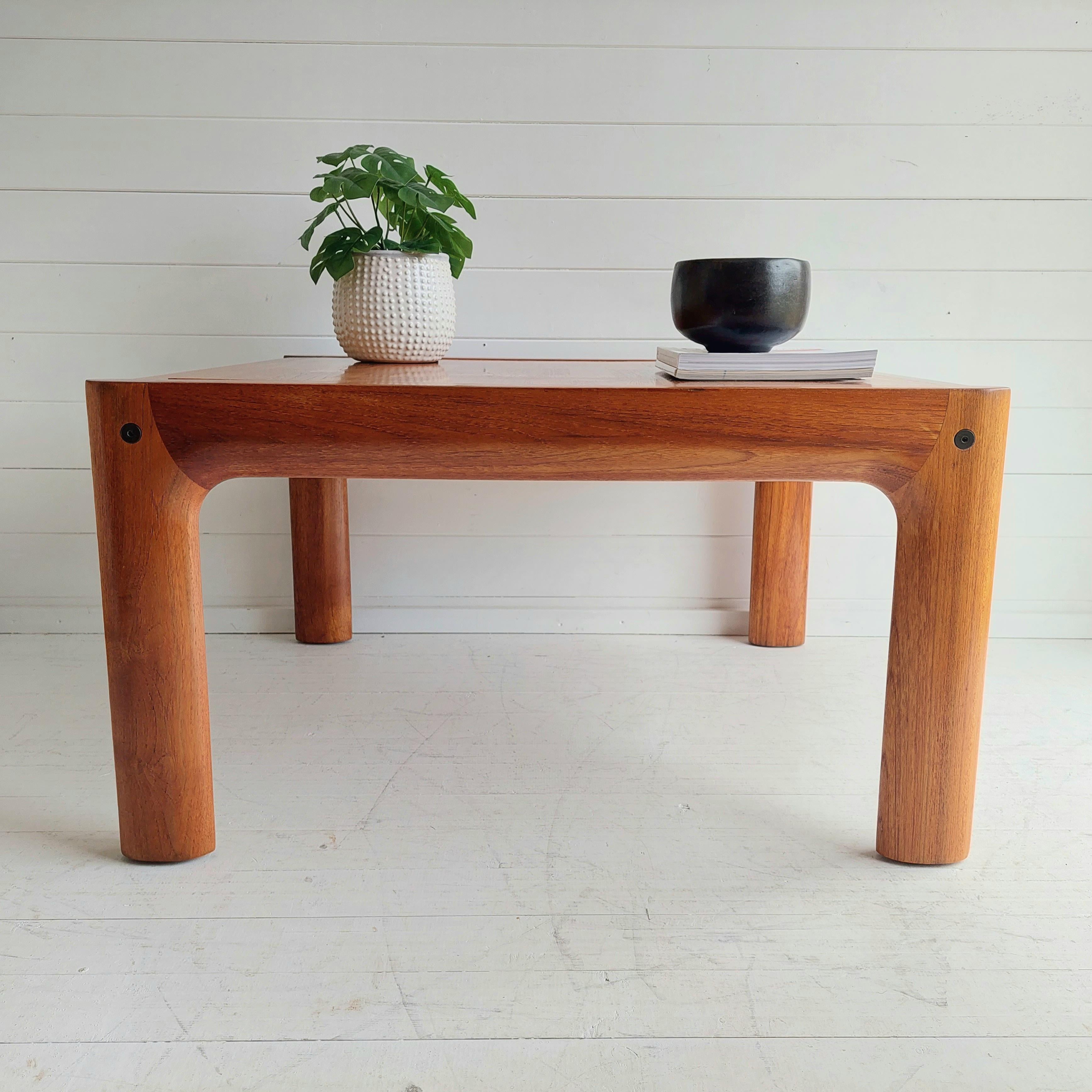 Rectangle nerly Square Asko oak coffee table by famed Finnish design company, Asko. 
Scandinavian design from the 70s

The design is simply, unique and impressive. 
Denotes robustness, having simple and organic lines at the same time.
This is a