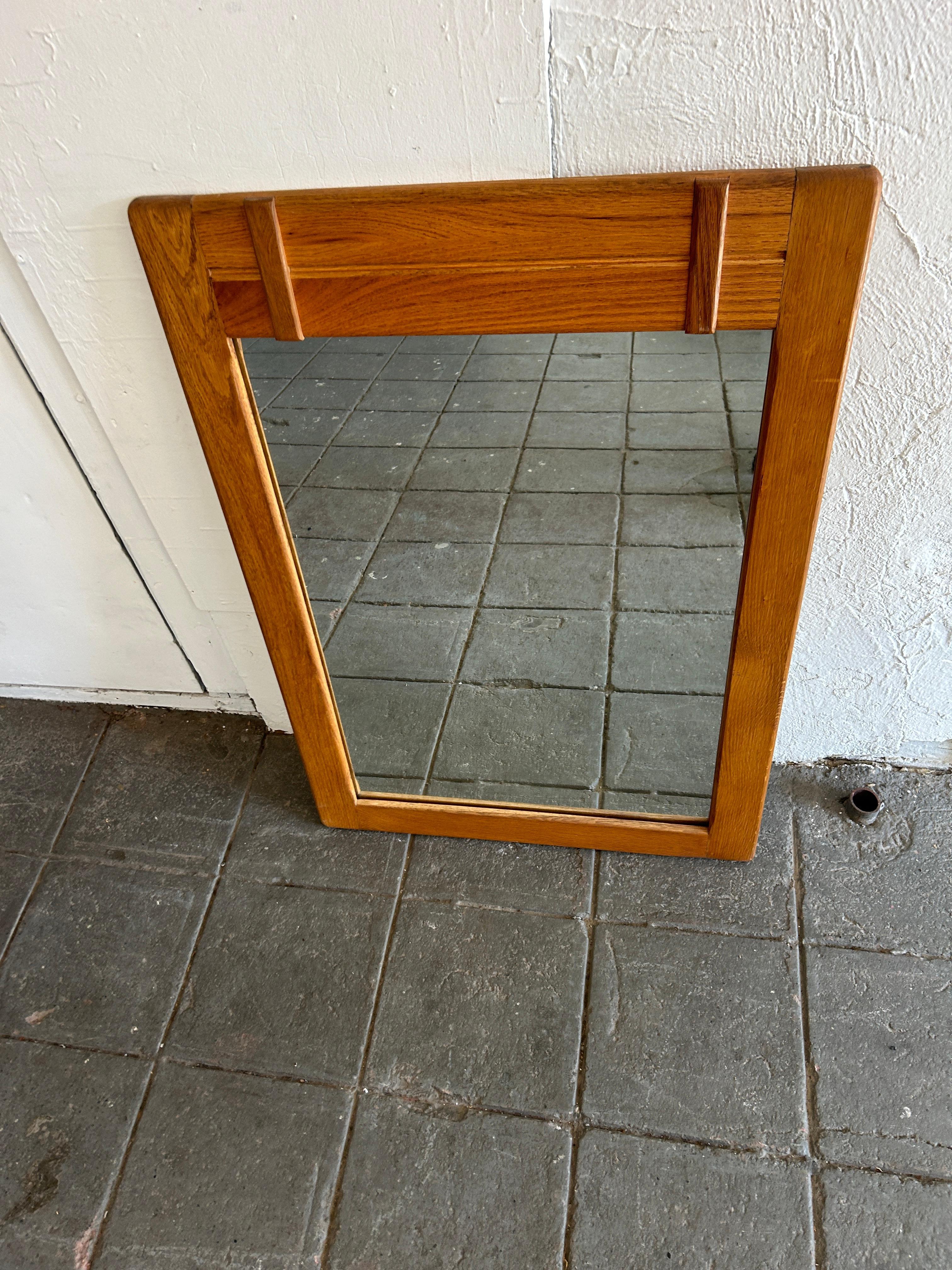 Mid century Scandinavian modern vertical wall mirror. Solid pine wood frame with wood details and thick mirror. Wired to hang vertical. Located in Brooklyn NYC.

29” w x 42” h x 1” thick