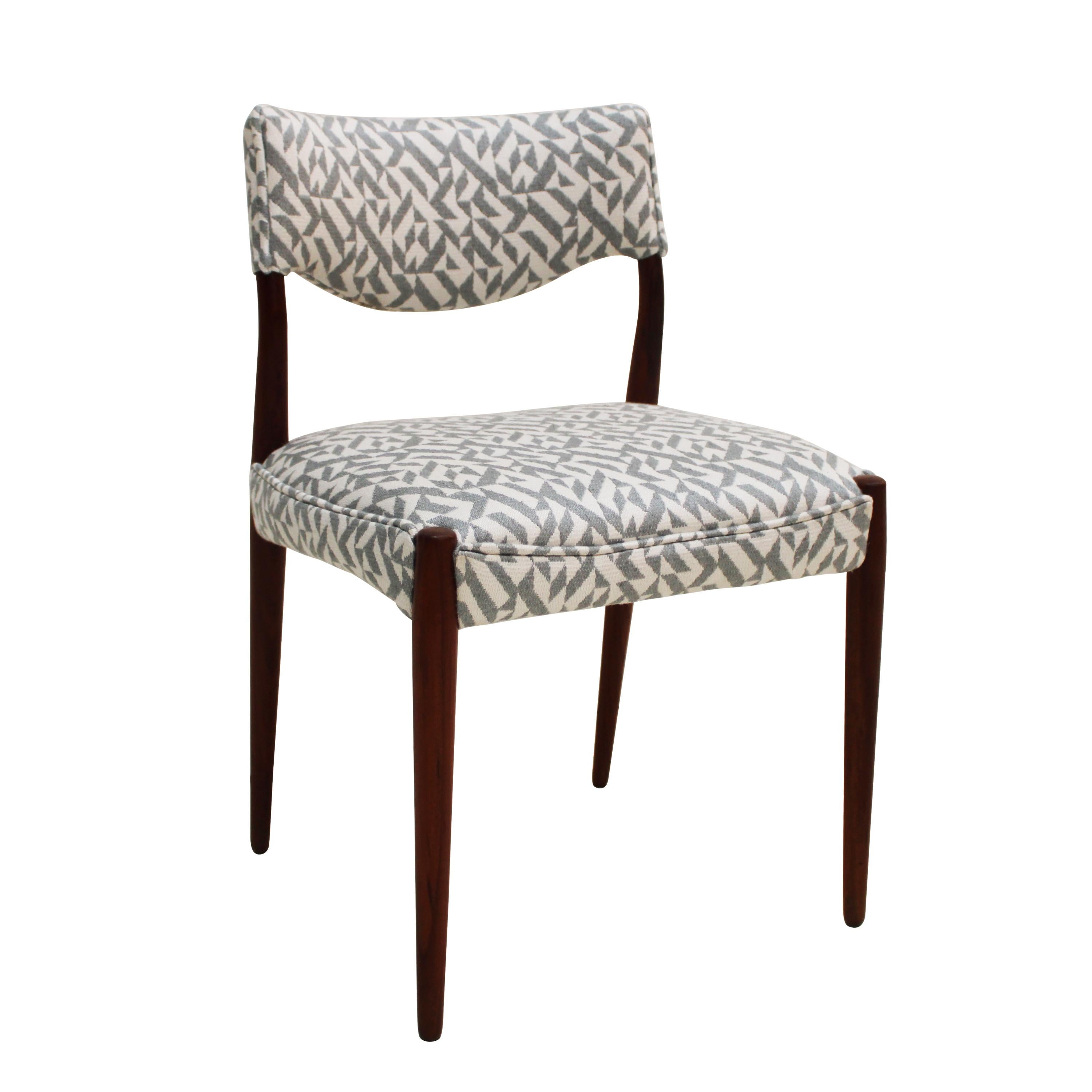 Set of five scandinavian chairs made in solid mahogany wood. Reupholstered in geometric patterned fabric.