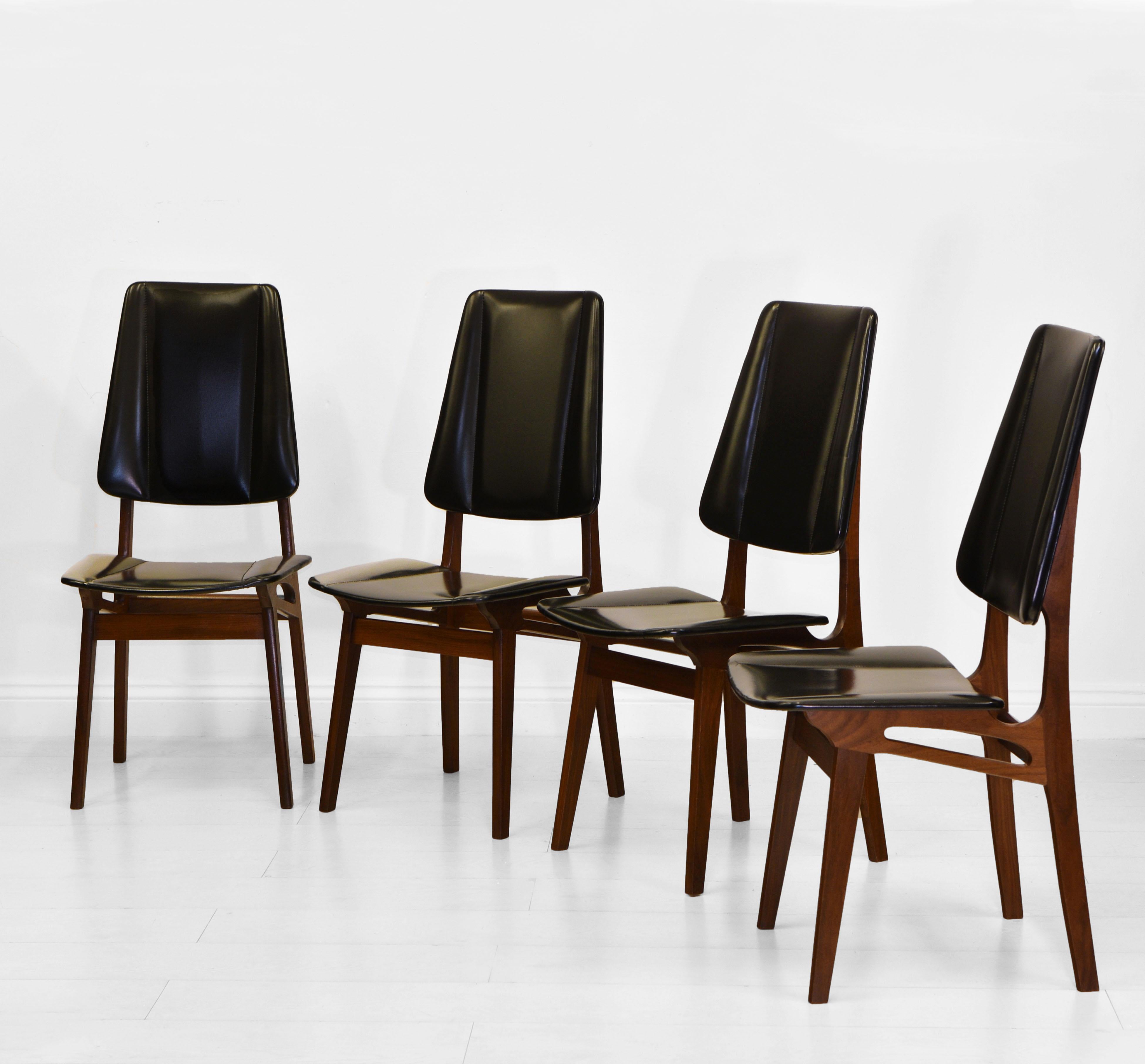 A wonderful set of four Scandinavian mid century teak and black vinyl high back dining chairs by Brødrene Sörheim - Norway. Circa 1960's. Maker's stamps.

The chairs are made in solid teak and have a sculptural design to them, with the original