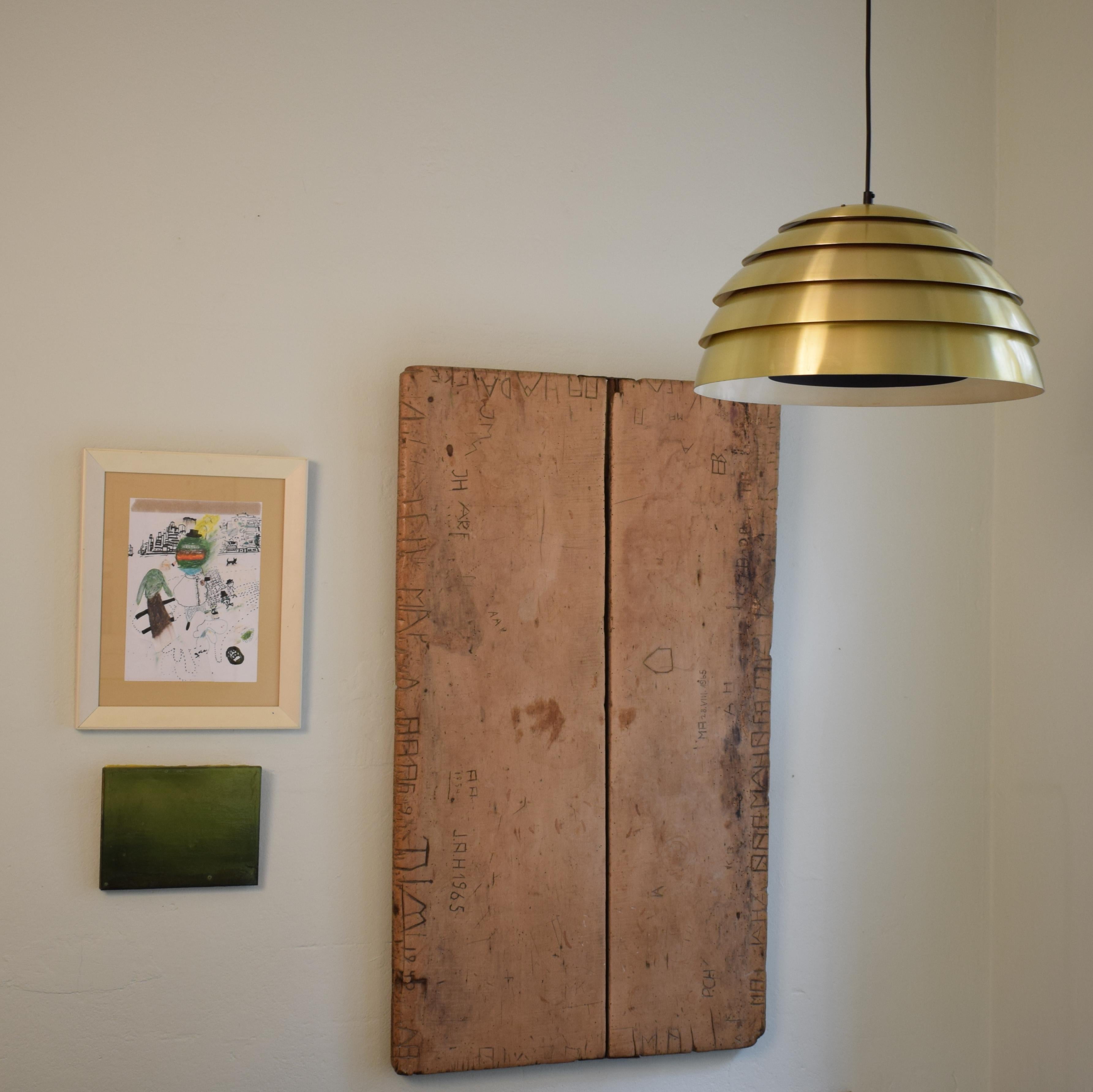This beautiful midcentury Scandinavian / Swedish brass pendant was designed by Hans-Agne Jakobsson for Markaryd in the 1960s.
The lamp has got a cable which you can adjust in height. At the moment it is 140cm long.
A unique piece which is a great