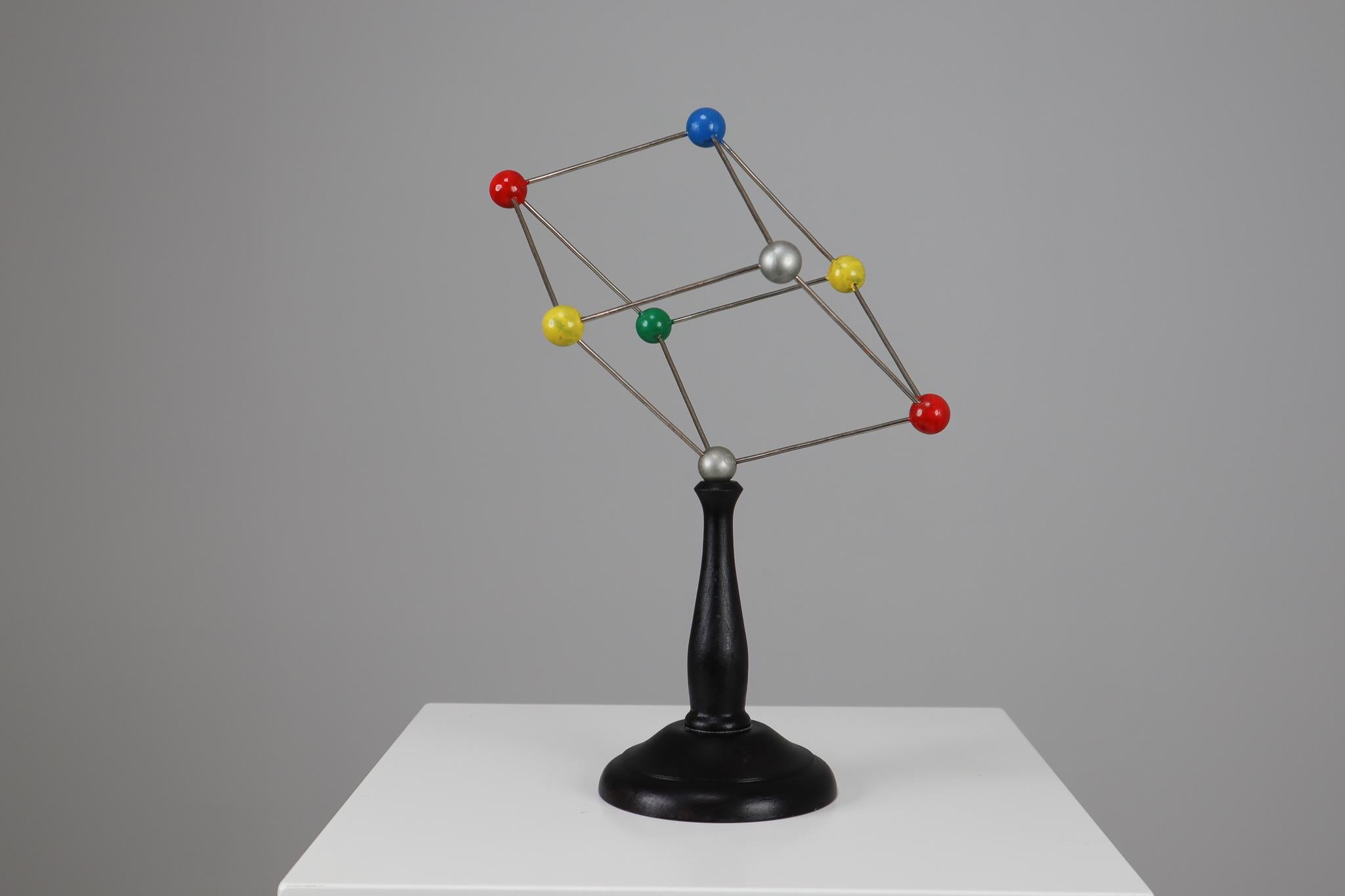 Mid-century scientific crystal model from Czechoslovakia from the 1960s. Made for educational reasons, used for classroom demonstration and study. In good condition with signs of age and patina.