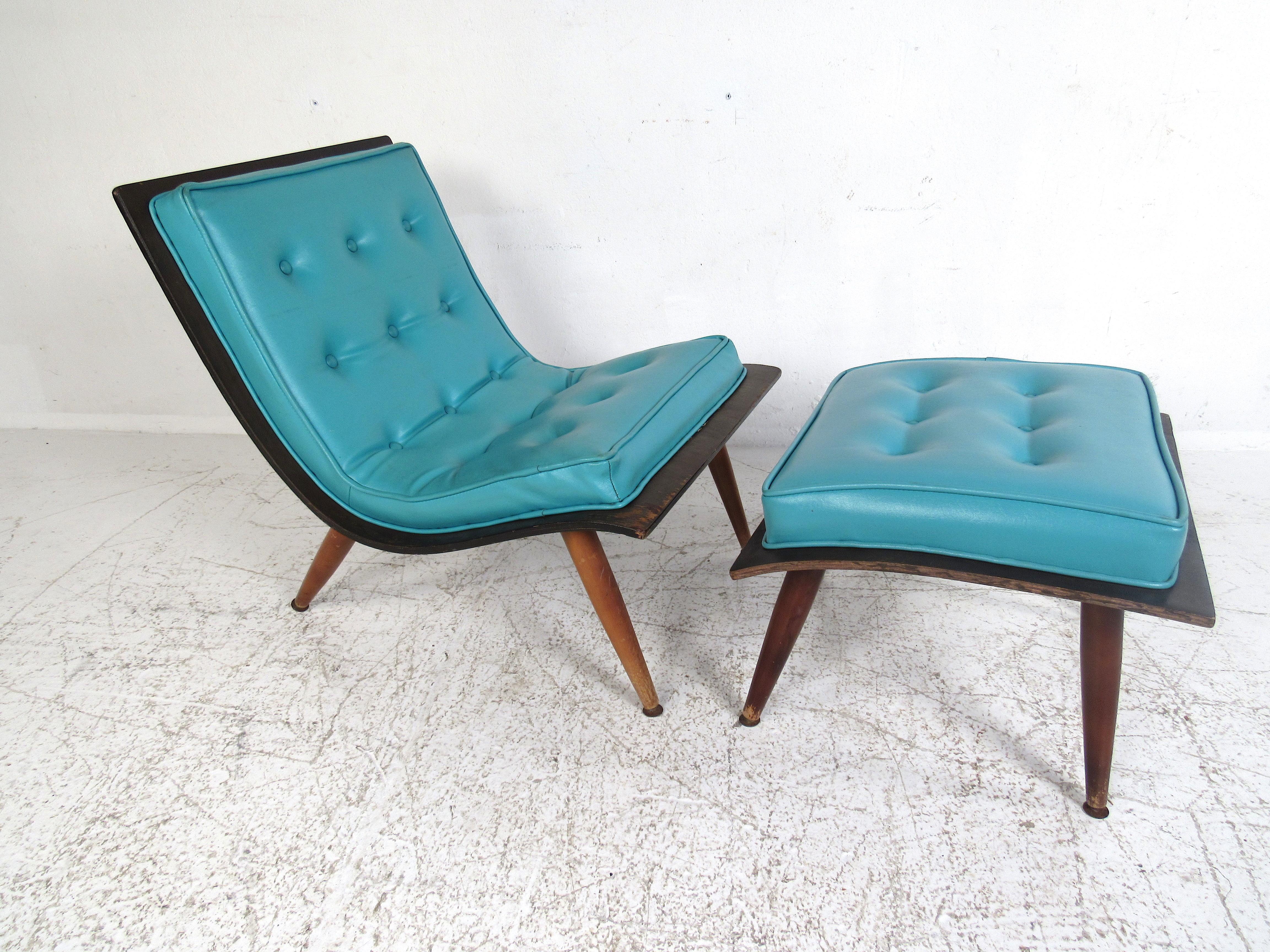 This beautifully vibrant midcentury chair and ottoman are a must-have for any upbeat living room or home office. Featuring dark wood and bright turquoise cushions this set will add character and charm to any space it is in. It features a simplistic