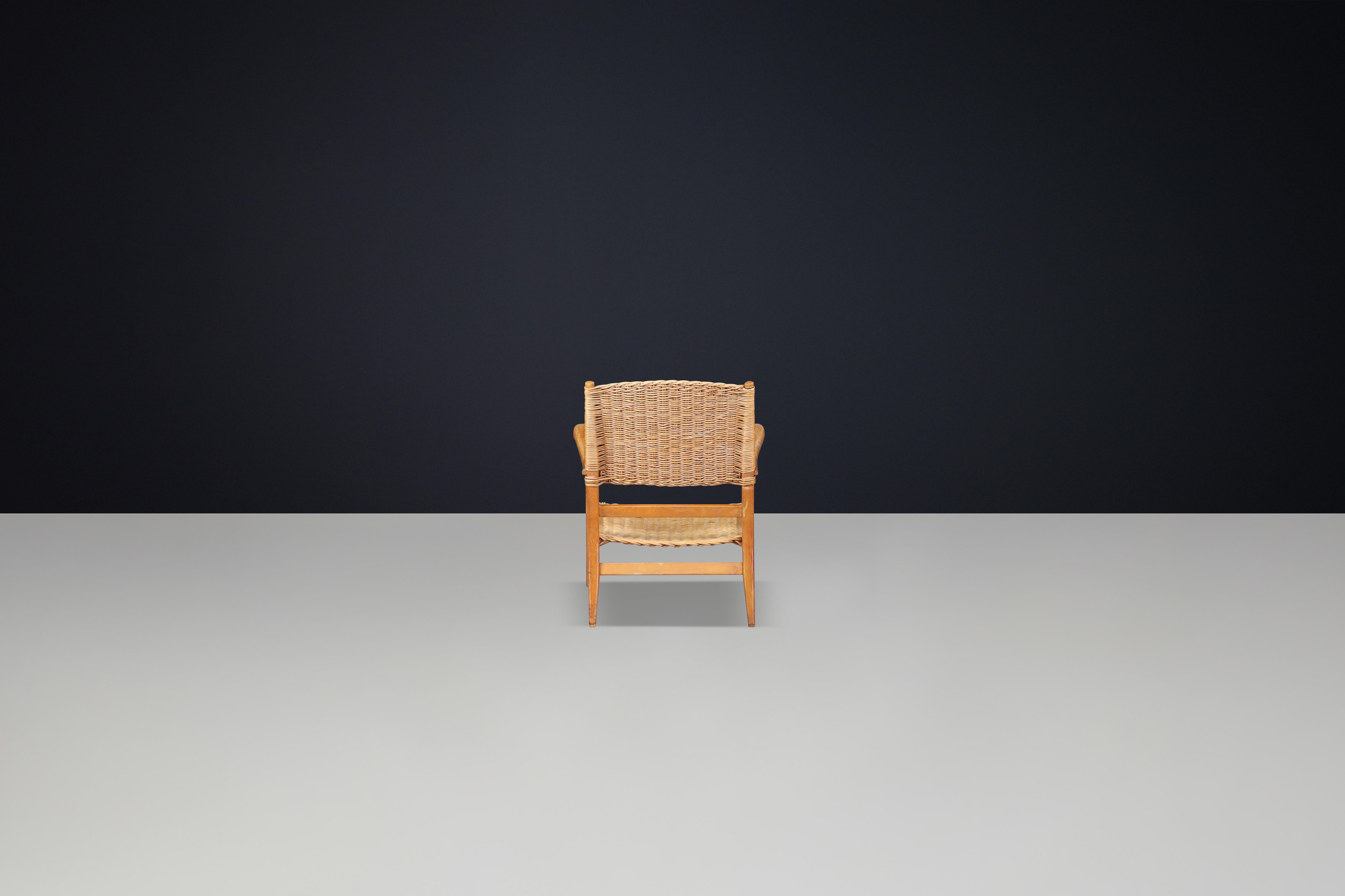 20th Century Mid-Century Sculpted Armchair in Oak and Rattan, France, 1950s For Sale