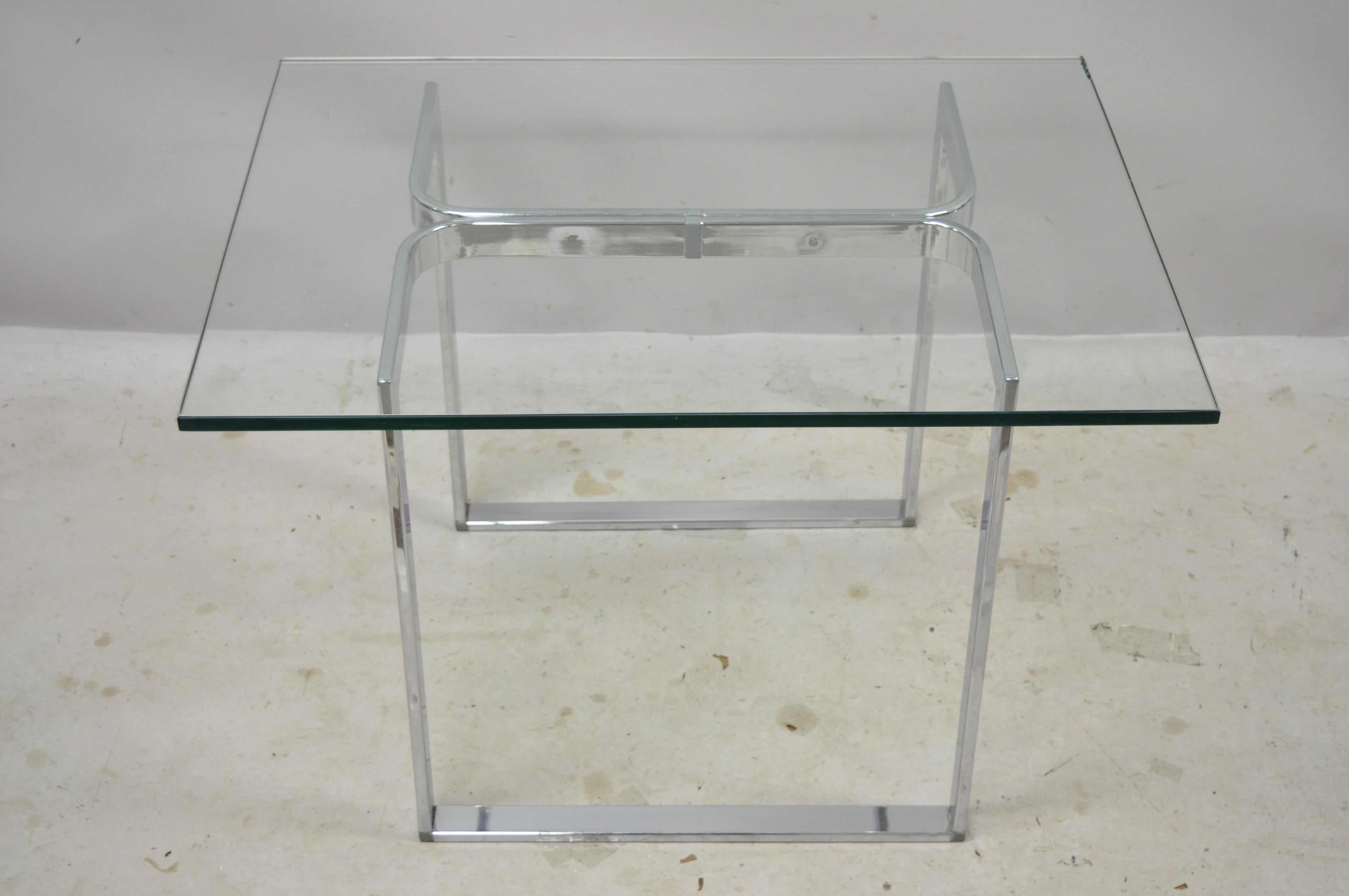Mid-Century Modern sculpted chrome base rectangular glass top occasional side table. Item features sculptural chrome base, thick rectangular glass top, clean modernist lines, great style and form. Circa mid-late 20th century. Measurements: 21.5