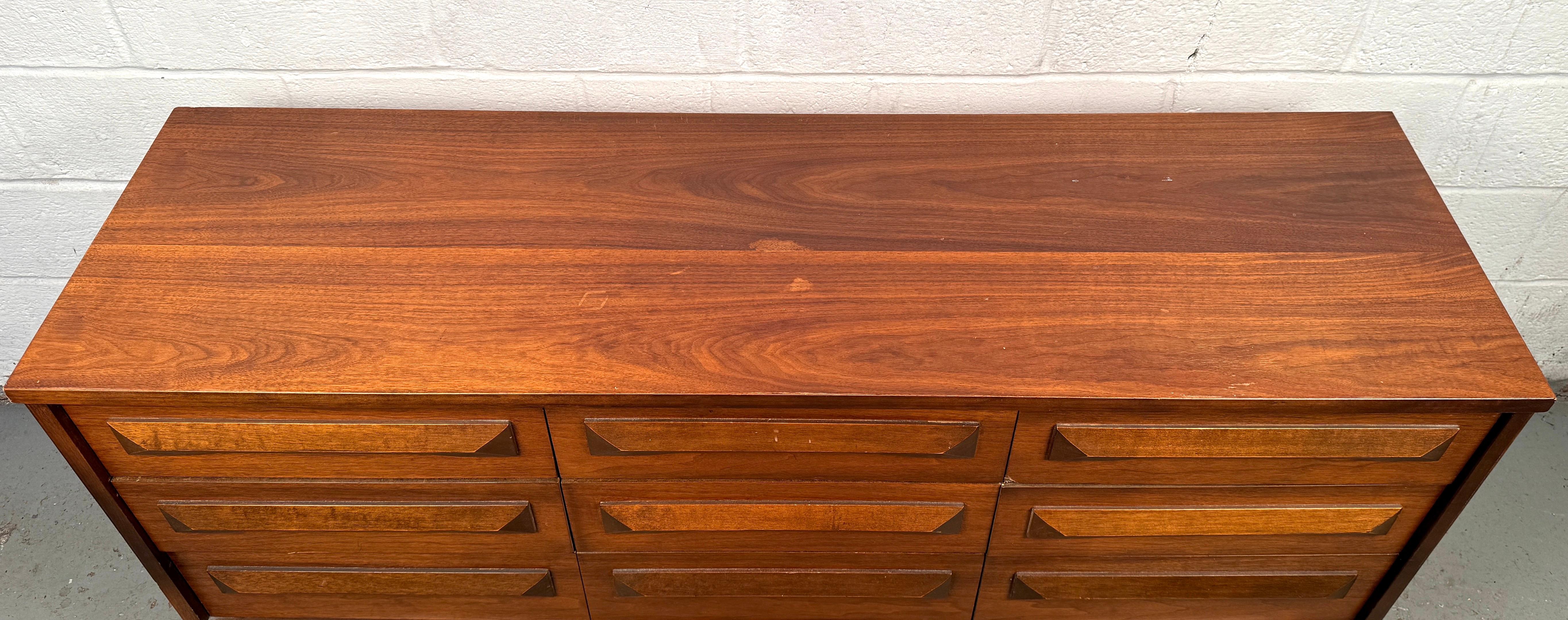 Mid-Century Sculpted Nine Drawer Dresser For Sale 1