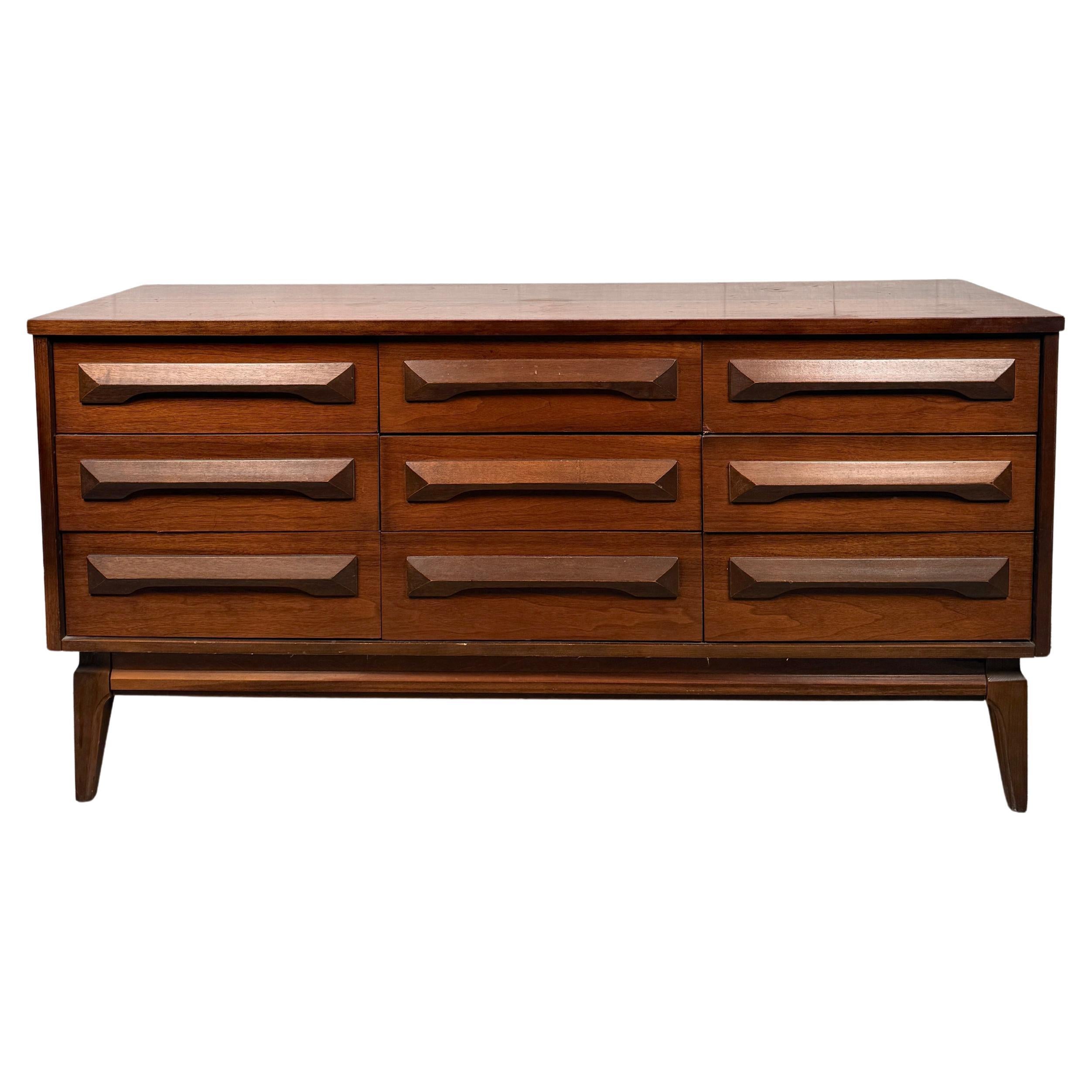 Mid-Century Sculpted Nine Drawer Dresser