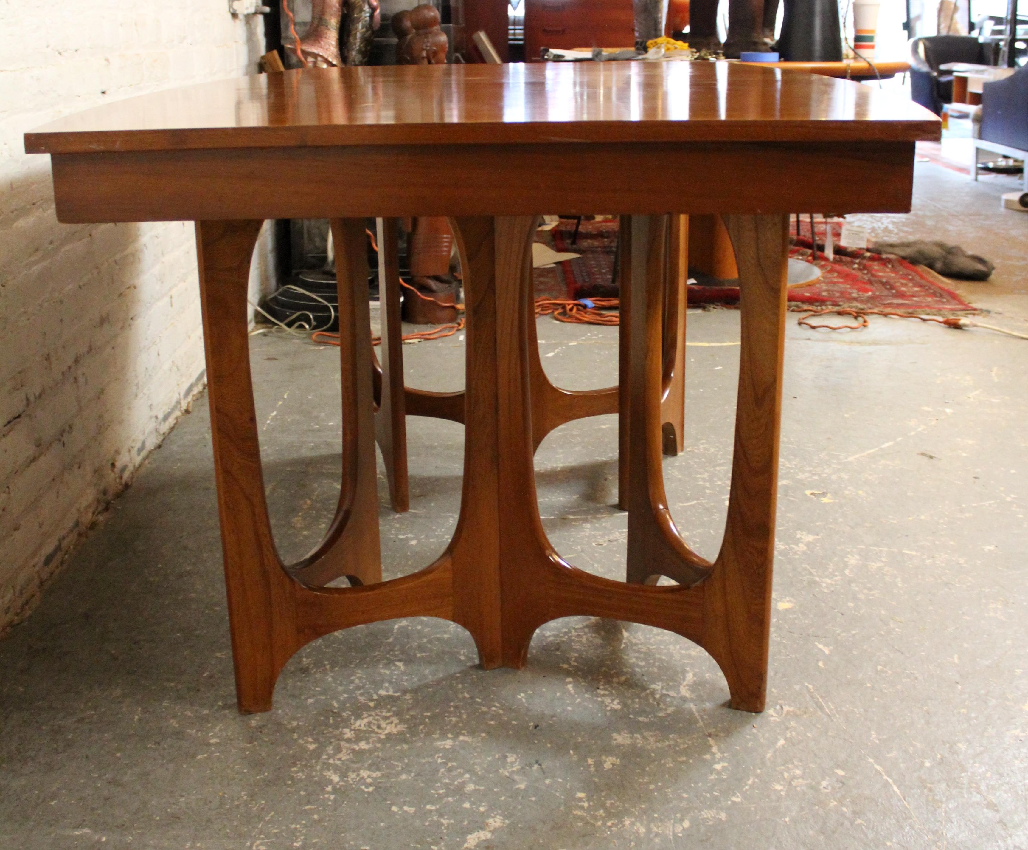 American Mid-Century Sculpted Walnut Dining Table by Young Manufacturing Co. For Sale