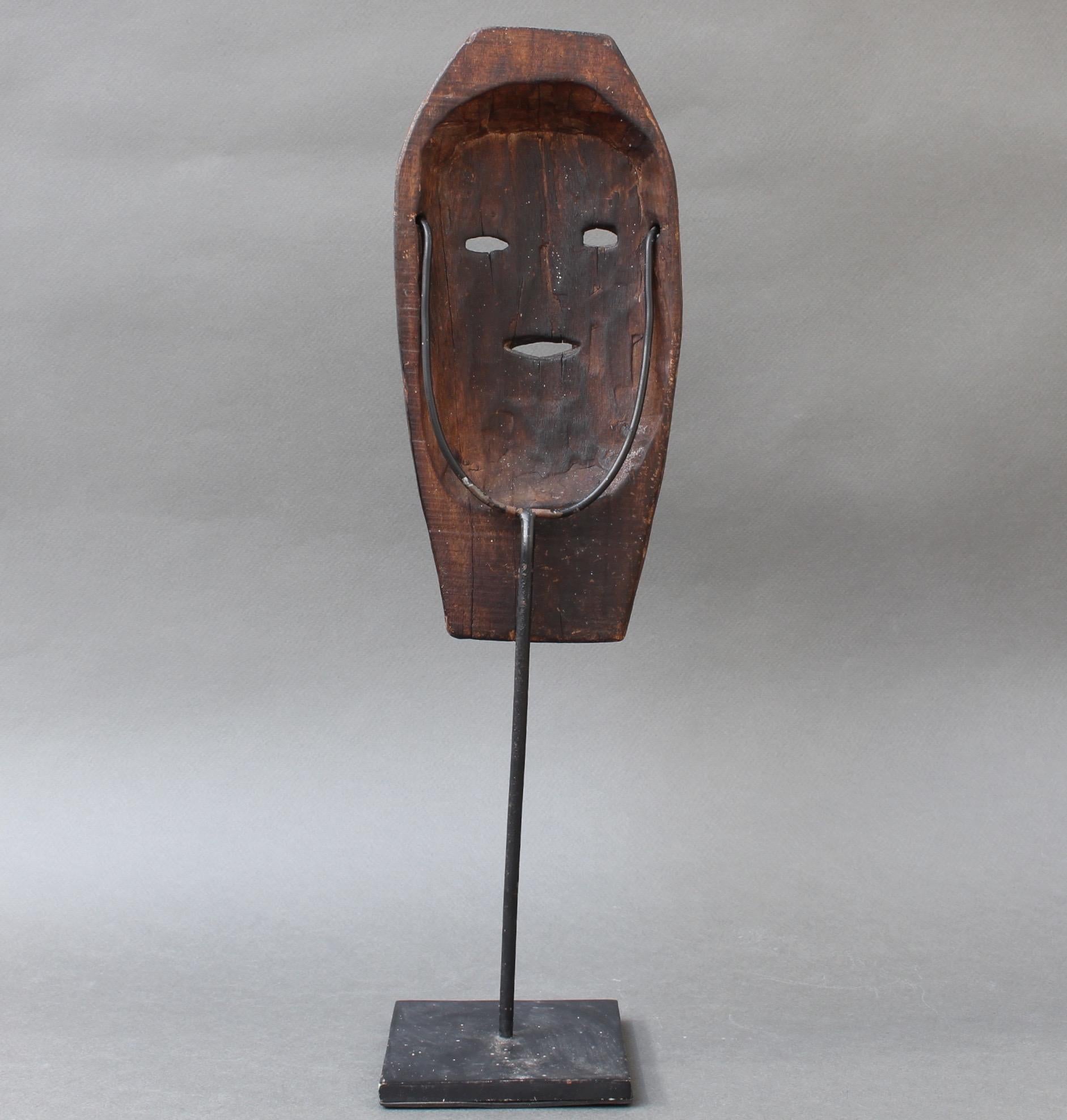 Hand-Carved Midcentury Sculpted Wooden Traditional Mask from Timor Island, Indonesia