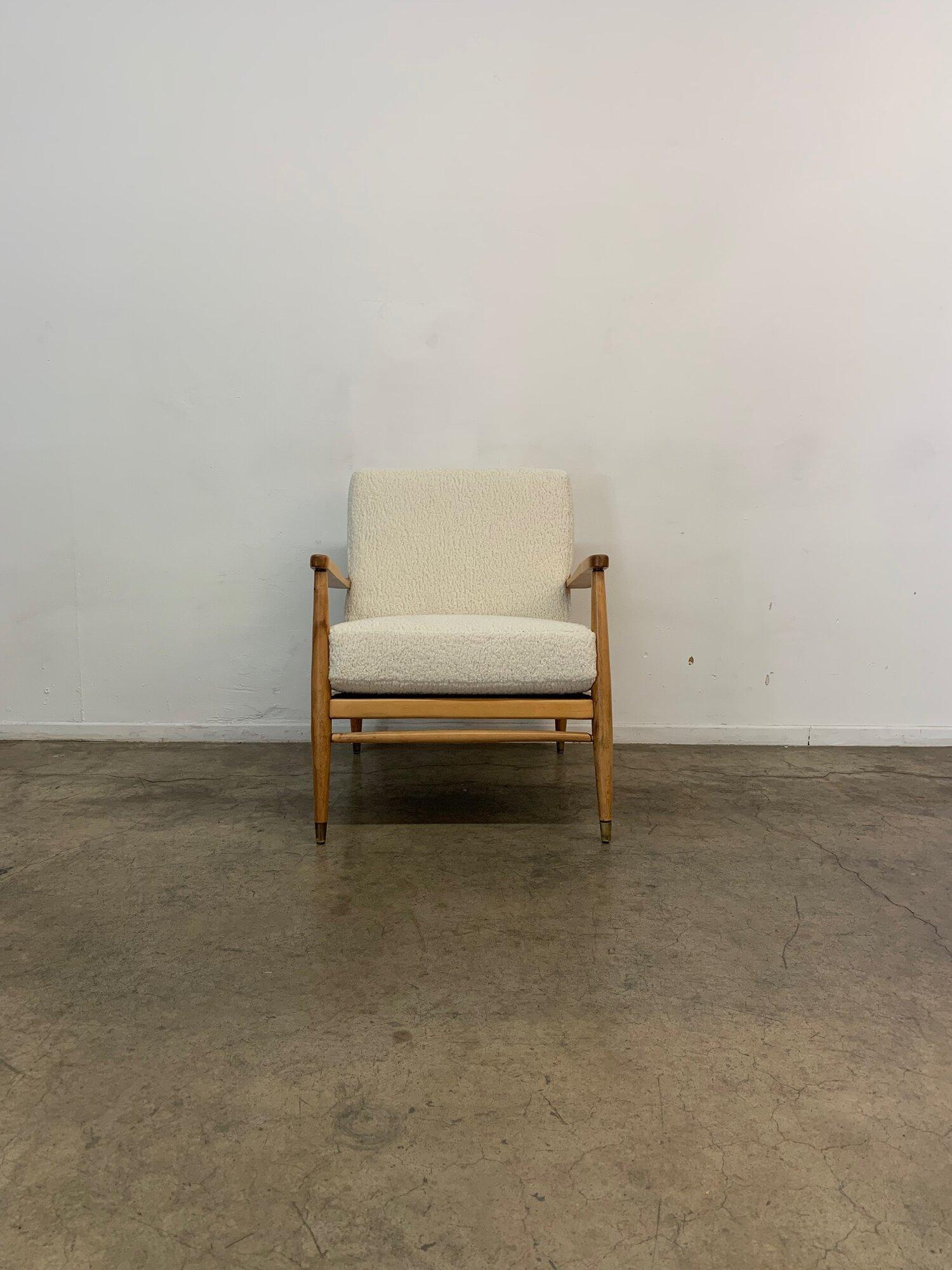 W27 // D27 // H30

SW22 // SD18 // SH18 // AH6

1950’s vintage lounge chair fully restored in a white Sherpa fabric with solid alder wood frame. The frame has been fully restored and the brass caps have been polished. 