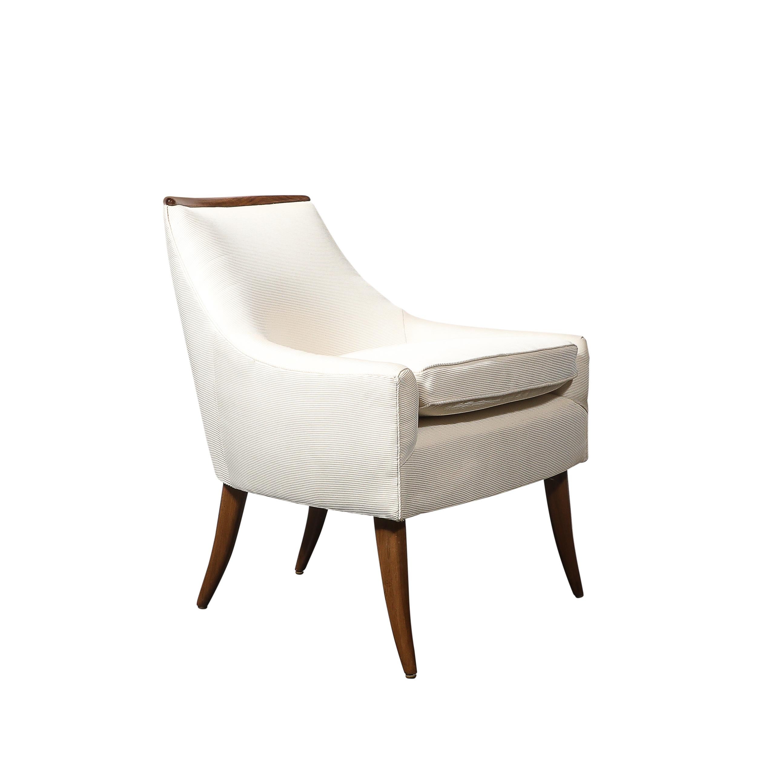 These exquisite mid-century modernist lounge chairs designed by the legendary Adrian Pearsall are an excellent exemple of the innovative craftsmanship and sculptural elegance that defines his work. 

Each chair is constructed from rich walnut,