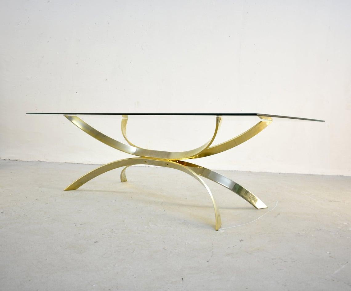 Beautiful extra-large Italian sculptural coffee table from 1970s

Unknown designer and producer

Design in the manner of Osvaldo Borsani

Heavy steel base is in gold finish which shows moderate traces of wear-there are some blemishes, as well