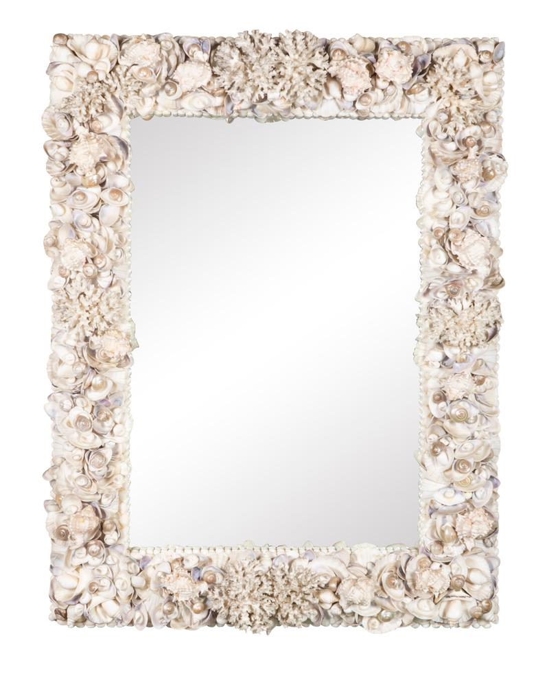 Fantastic midcentury sea shell and coral mirror. This unique mirror was painstakingly assembled from hundreds of various types of sea shells balanced by pieces of white coral. A stunning decorative sculpture, as well as a mirror. In the style of,