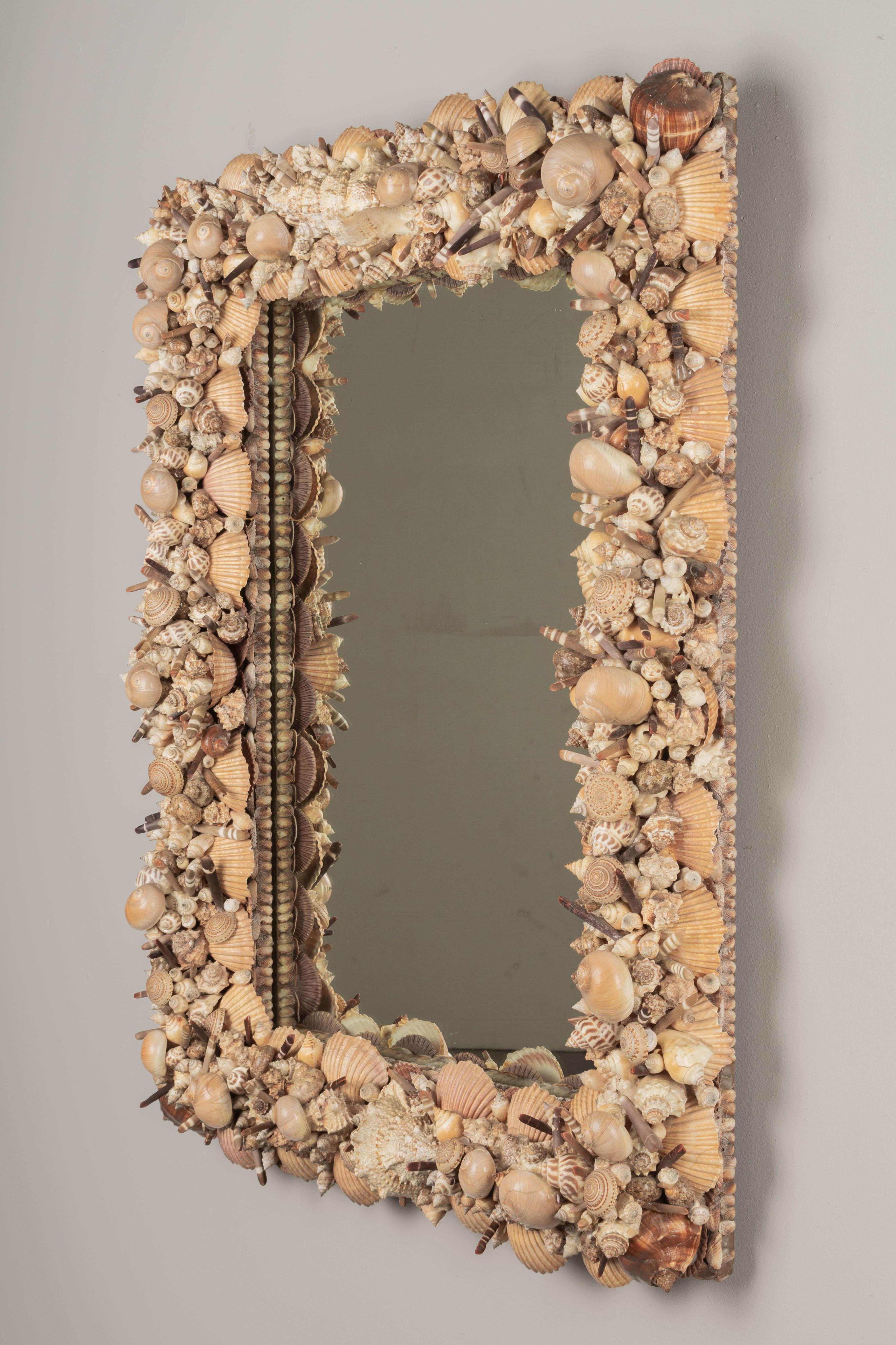 North American Mid Century Seashell Encrusted Wall Mirror For Sale