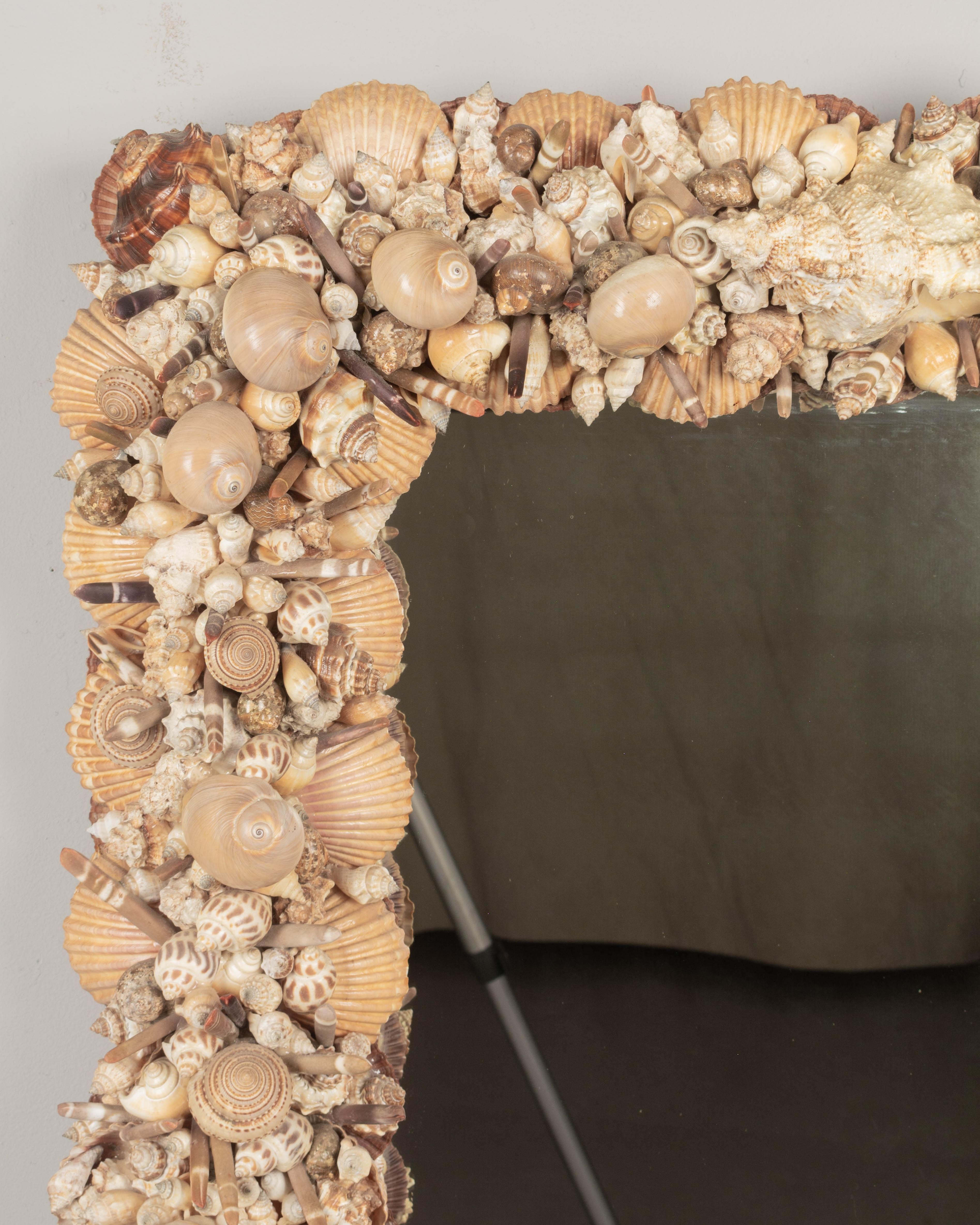 Hand-Crafted Mid Century Seashell Encrusted Wall Mirror For Sale