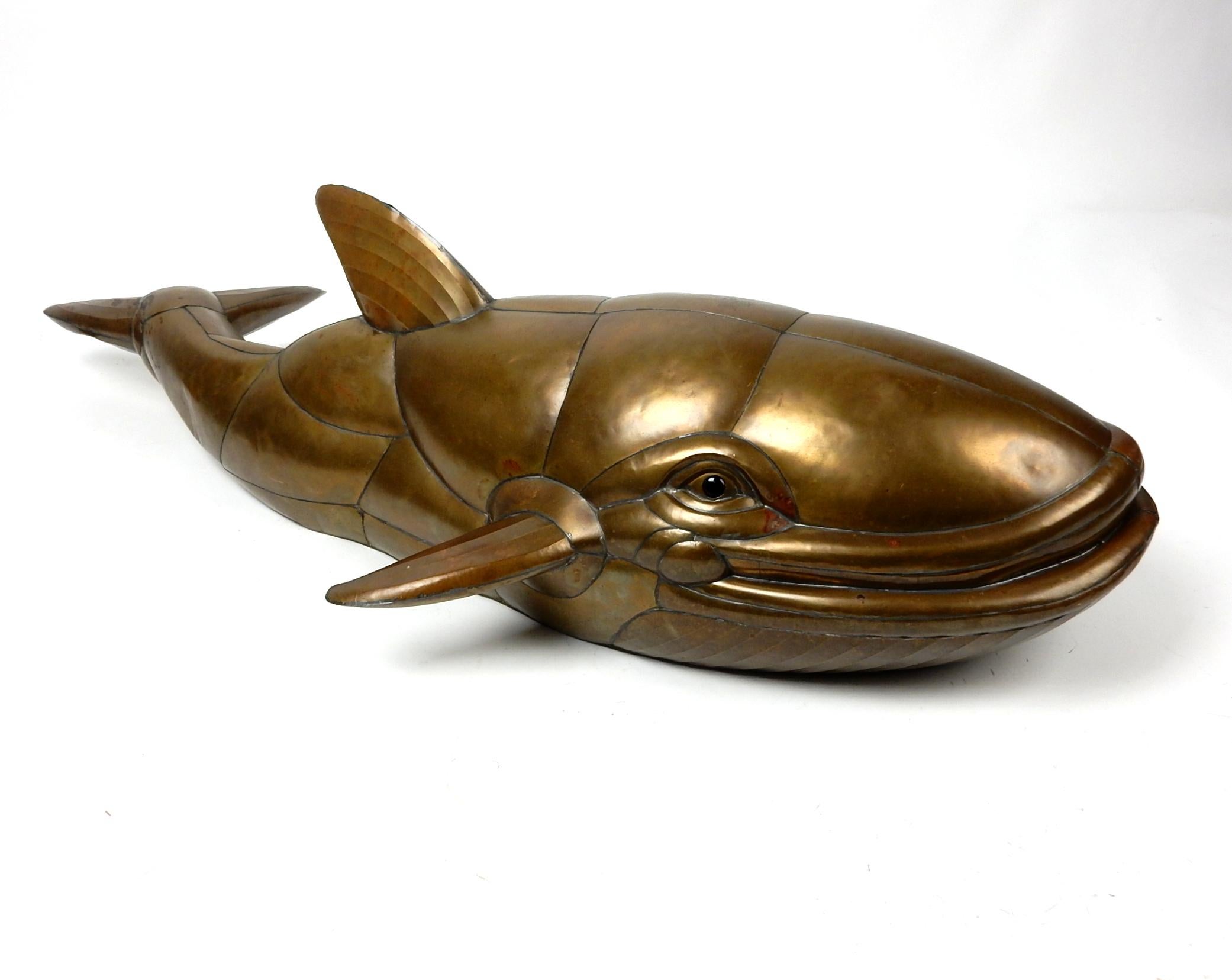 Rare brass and copper sculpture of a whale by Sergio Bustamante, circa 1970's
Un-signed. Measures 38