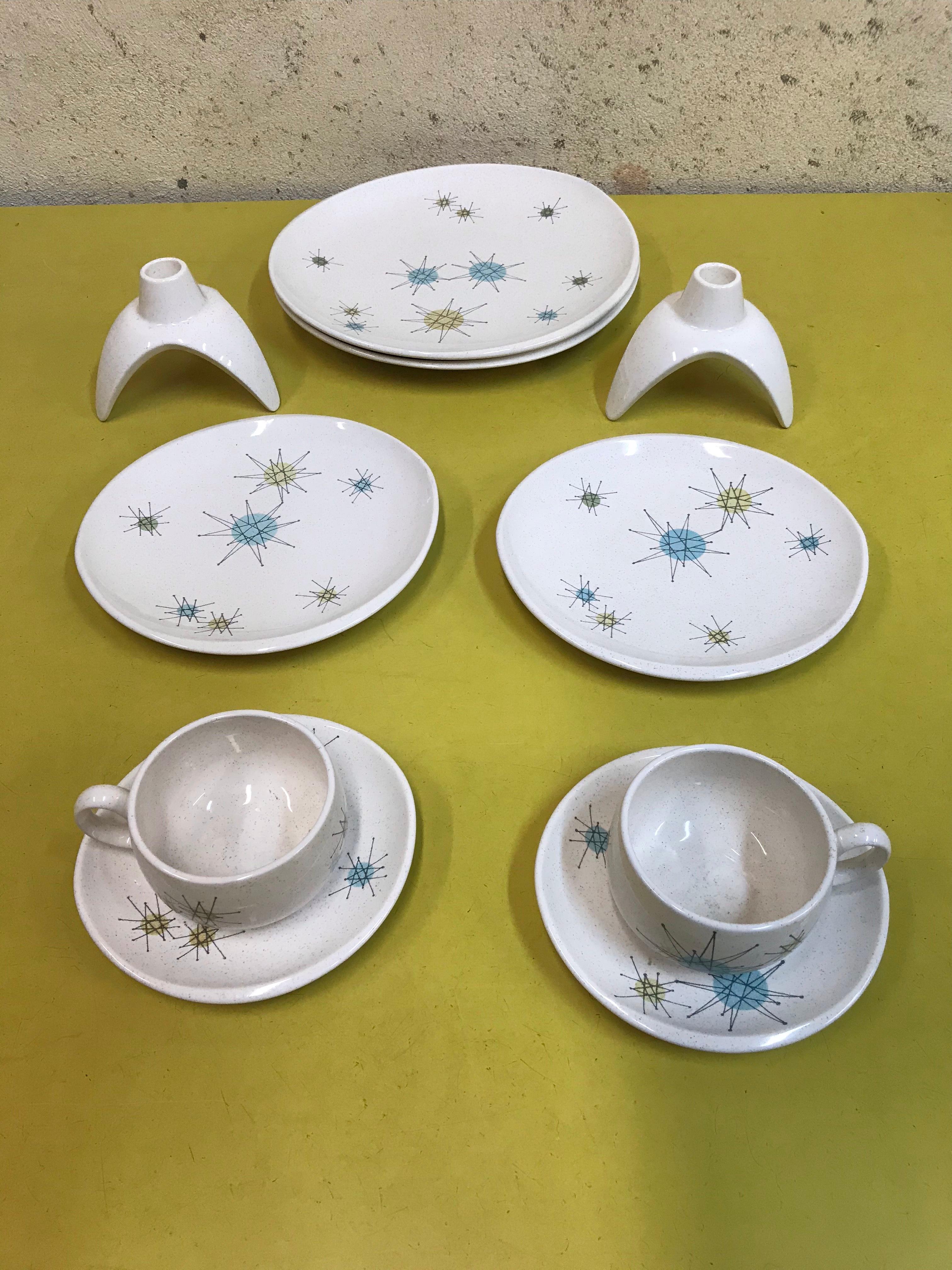 Franciscan Atomic starburst dinner set 2-dinner plates ,2- salad plates, 2- coffee cups and saucers. Included in this set is matching Franciscan candleholders!


