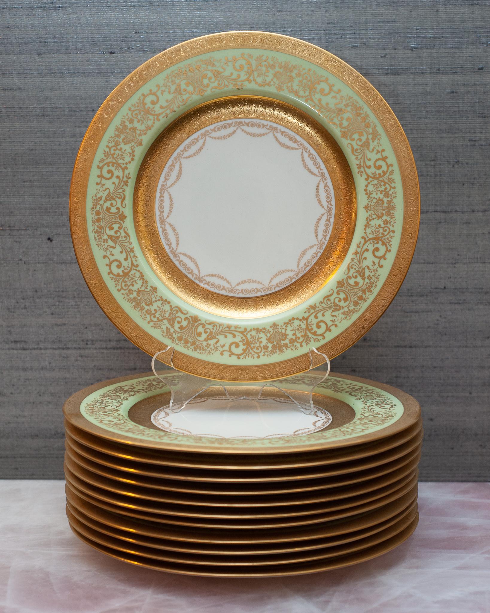 A beautiful set of 12 mid century Laurelton green and gold dishes for Fondeville New York