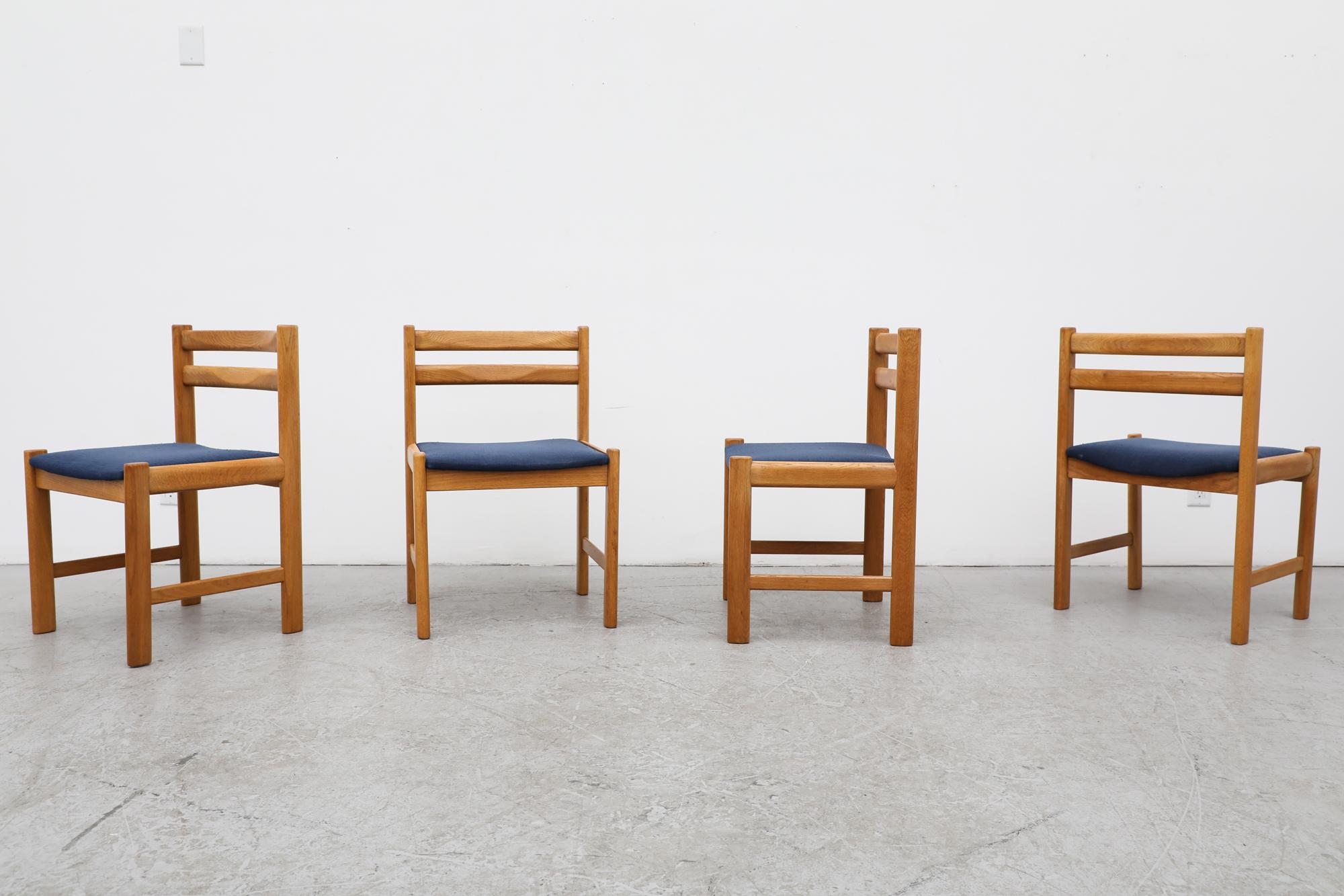 Set of 4 mid-century Danish oak dining chairs with original blue upholstery on seats, 1970s. In original condition with visible wear consistent with their age and use. Set price.