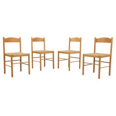 Ensemble de 4 chaises de salle à manger de style Vico Magistretti en bois blond avec sièges en jonc