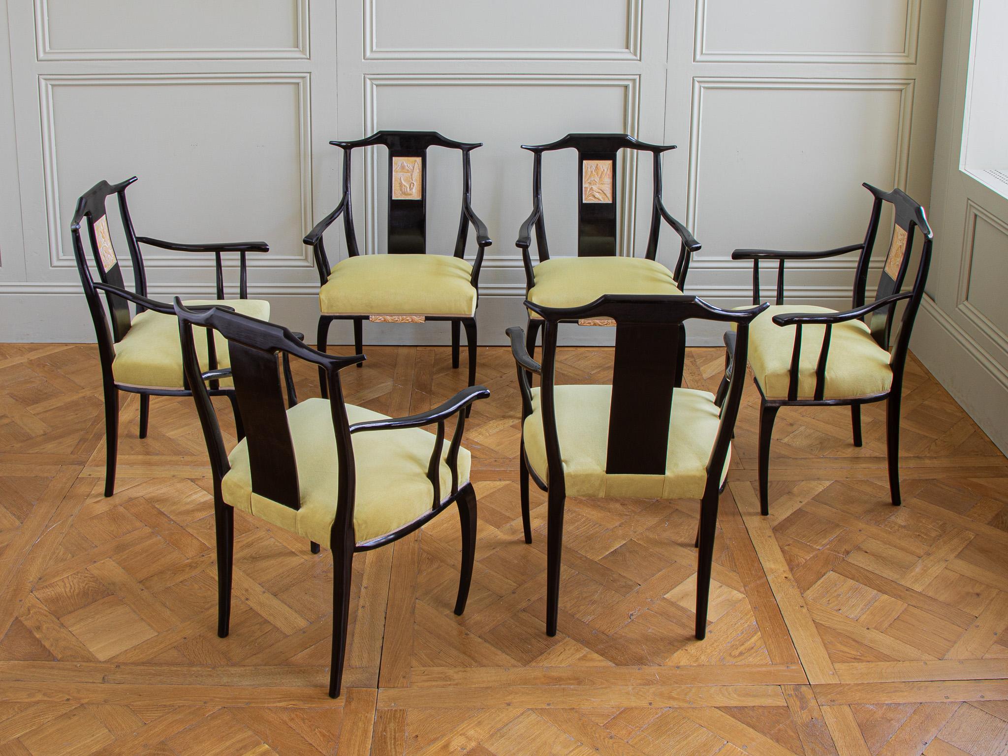 A unique set of six dining chairs, hand made, in France during the 1930's. The one off, designer chairs were commissioned to be oriental in style. The design has beautiful clean lines and subtle curves which are further enhanced by their original,