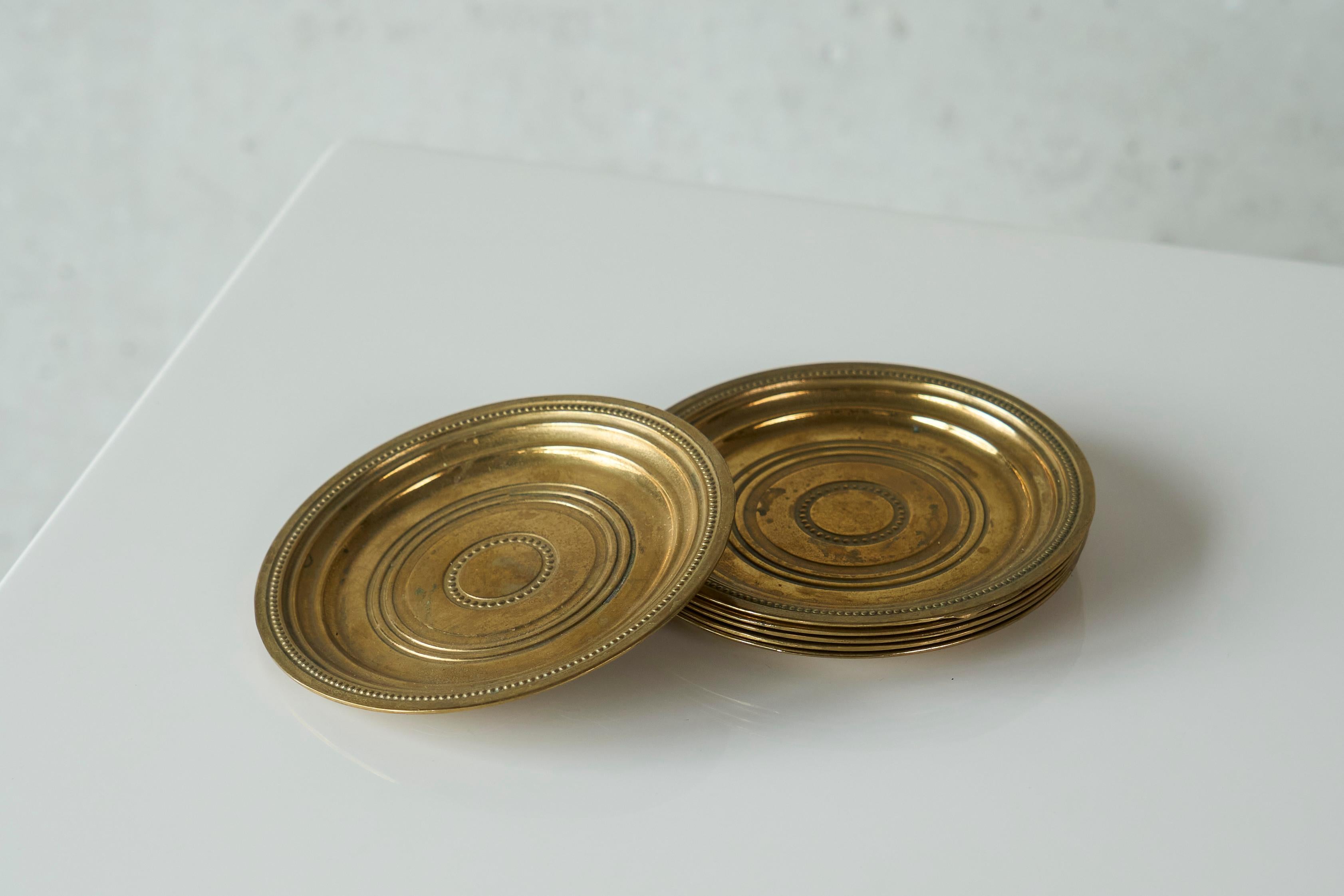 European Mid Century Set of 6 Coasters in Patinated Brass For Sale