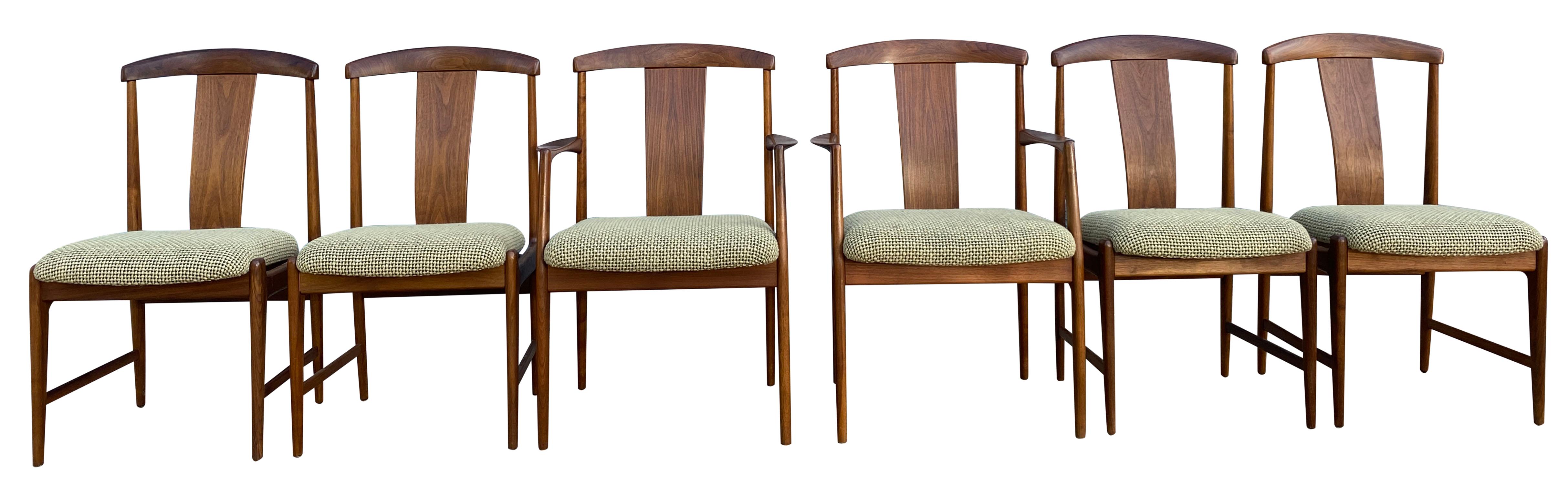 Beautiful midcentury set of 6 teak dining chairs by Folke Ohlsson for DUX. Very beautiful designed and crafted set of dining chairs with elegant curved backs. The set has all new wool woven upholstery very neutral tones hint of green and sand/tan