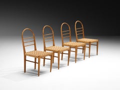 Mid-Century Set of Four Sculptural Dining Chairs in Cherry Wood with Rush Seats
