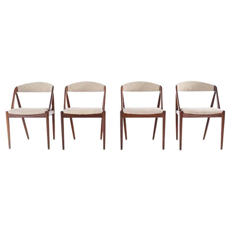 Mid Century Set of Four Teak and Fabric Dining Chairs by Kai Kristiansen For Sale