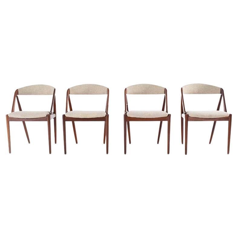 Mid Century Set of Four Teak and Fabric Dining Chairs by Kai Kristiansen
